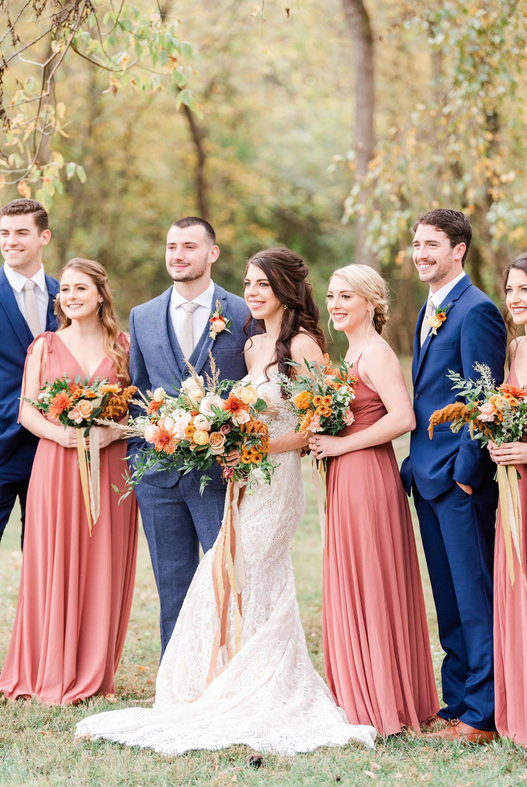 bride and groom pose with bridal party at Providence Cotton Mill