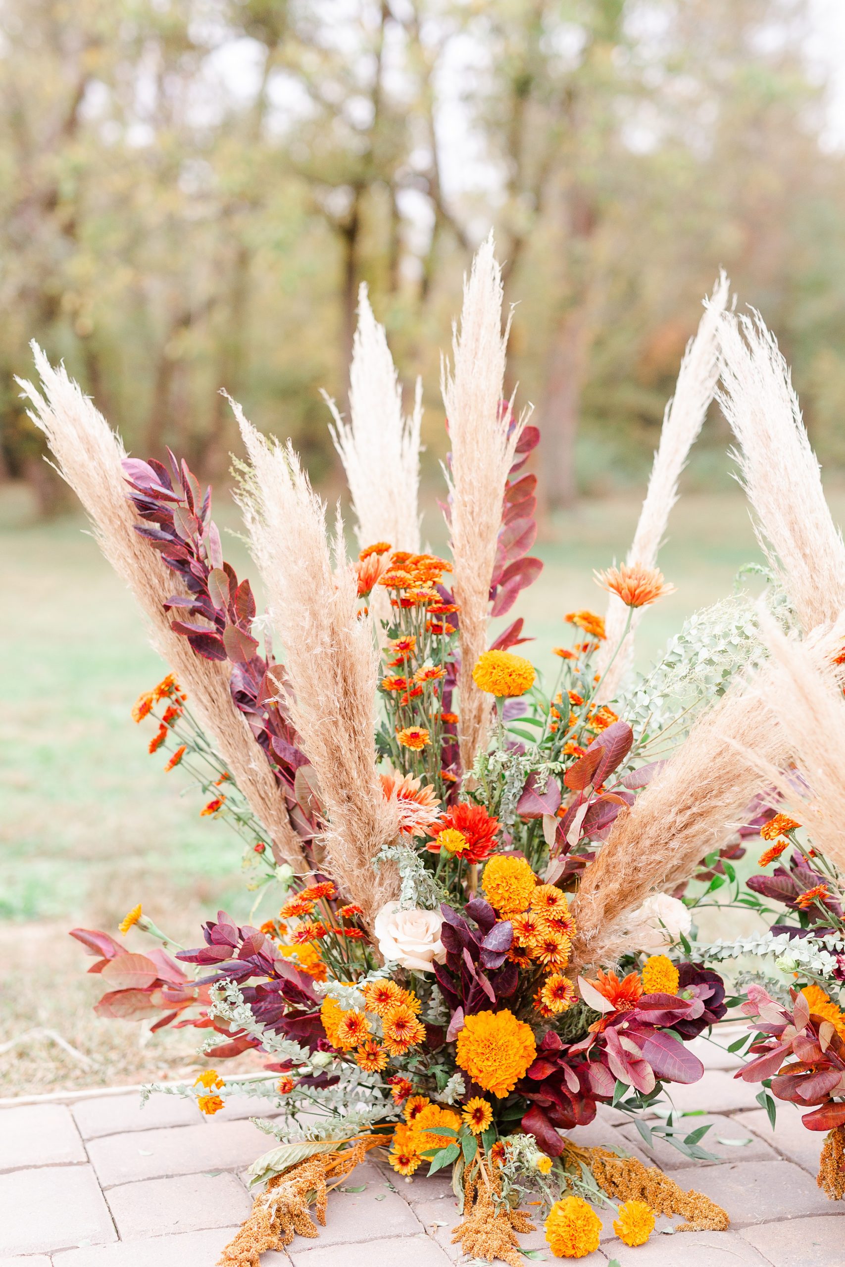 boho ceremony florals for fall wedding at Providence Cotton Mill