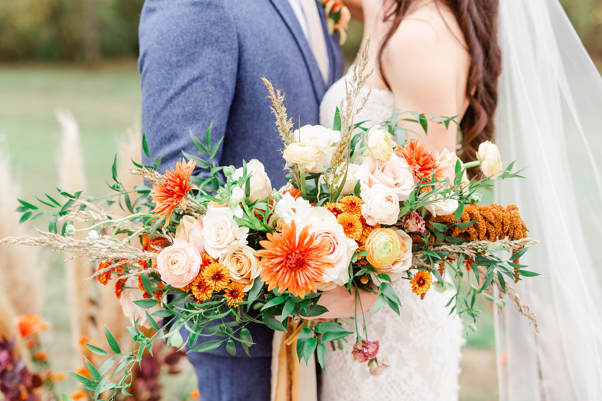 boho bridal bouquet with orange flowers