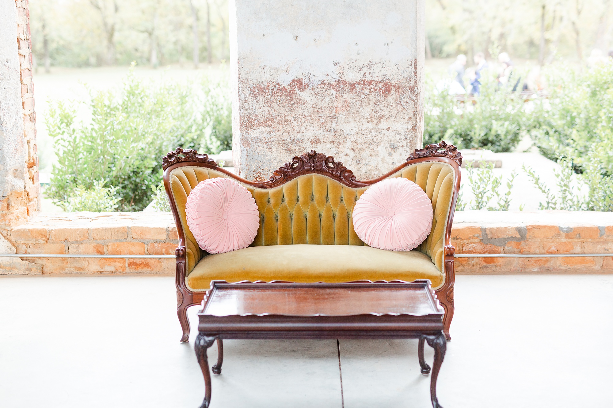 sitting area on vintage couch for Providence Cotton Mill wedding reception