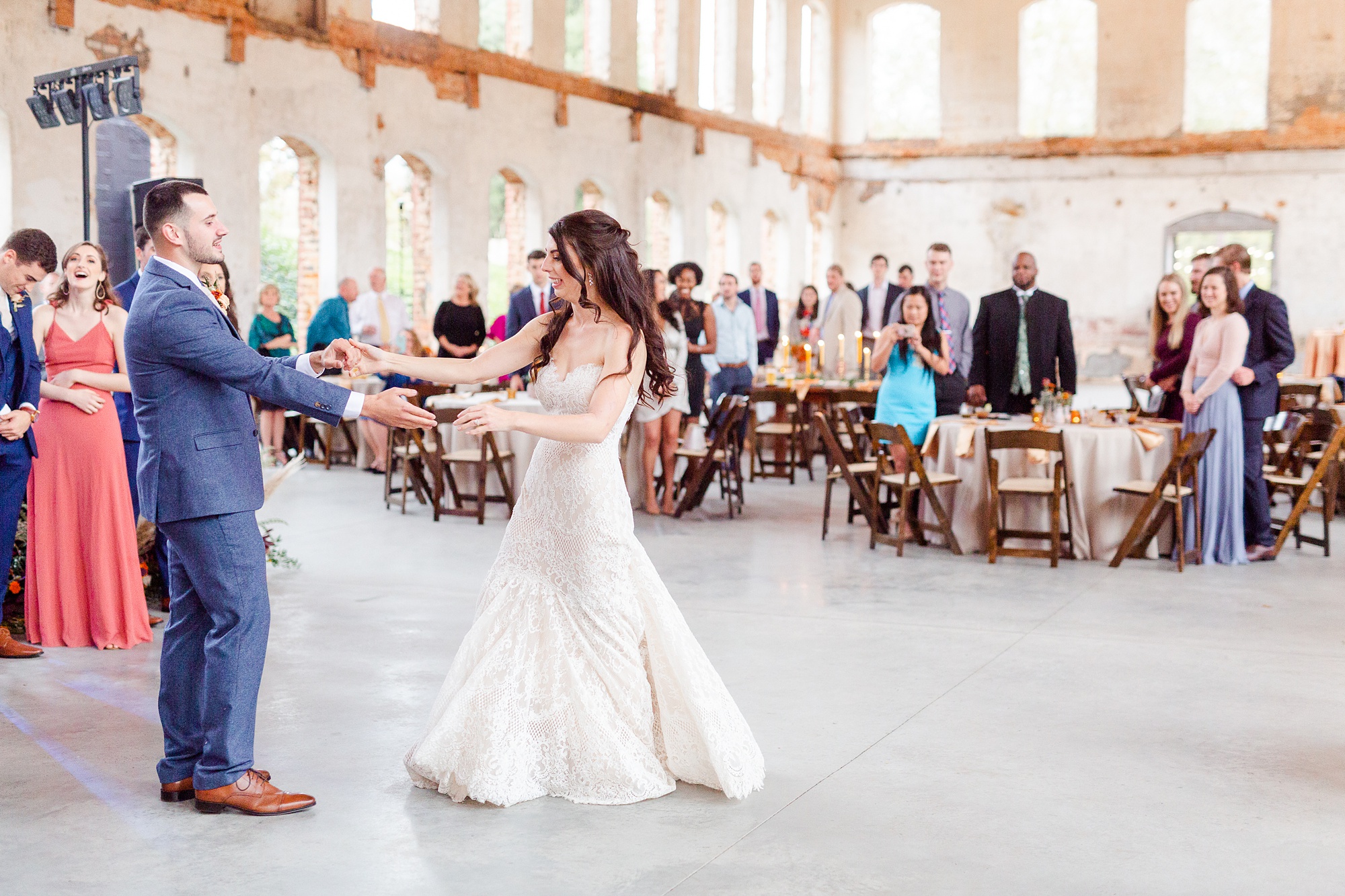 bride and groom's first dance at Providence Cotton Mill wedding reception
