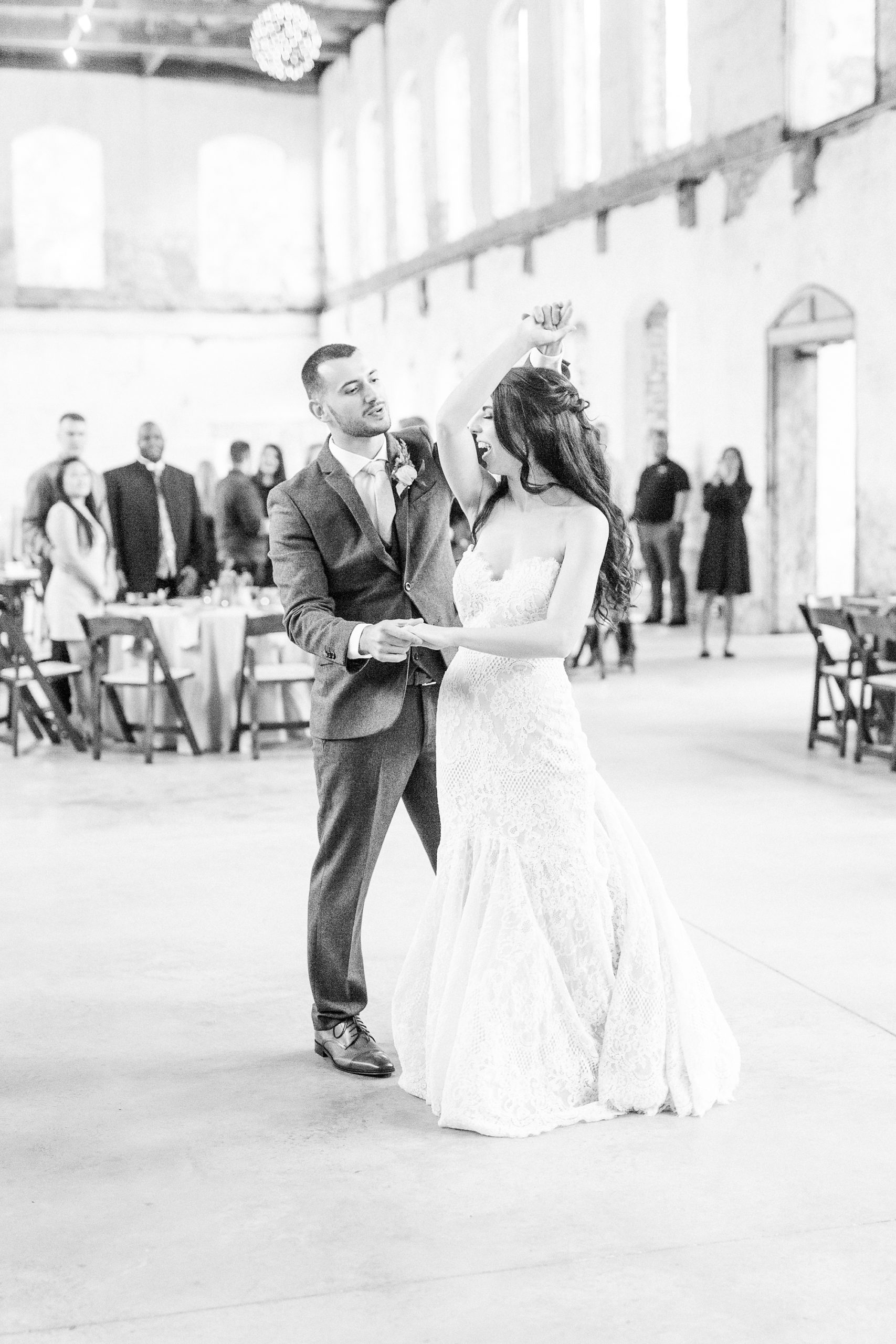 bride and groom's first dance at Providence Cotton Mill wedding reception