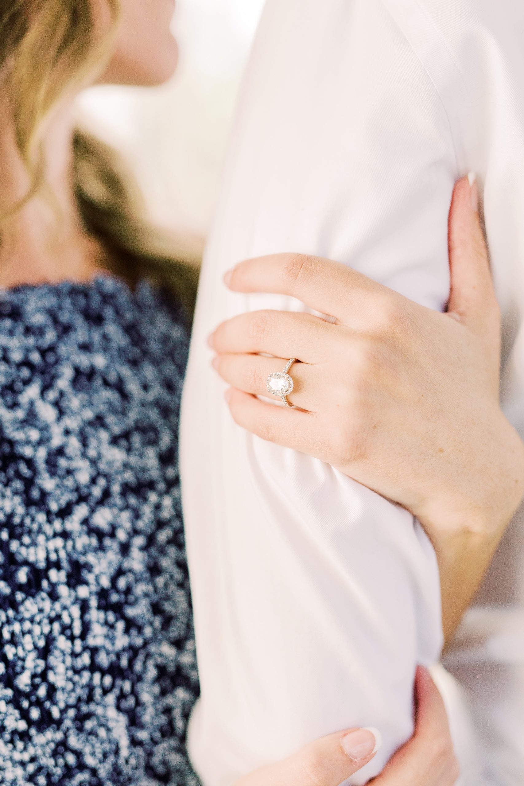 bride shows off engagement ring in Separk Mansion