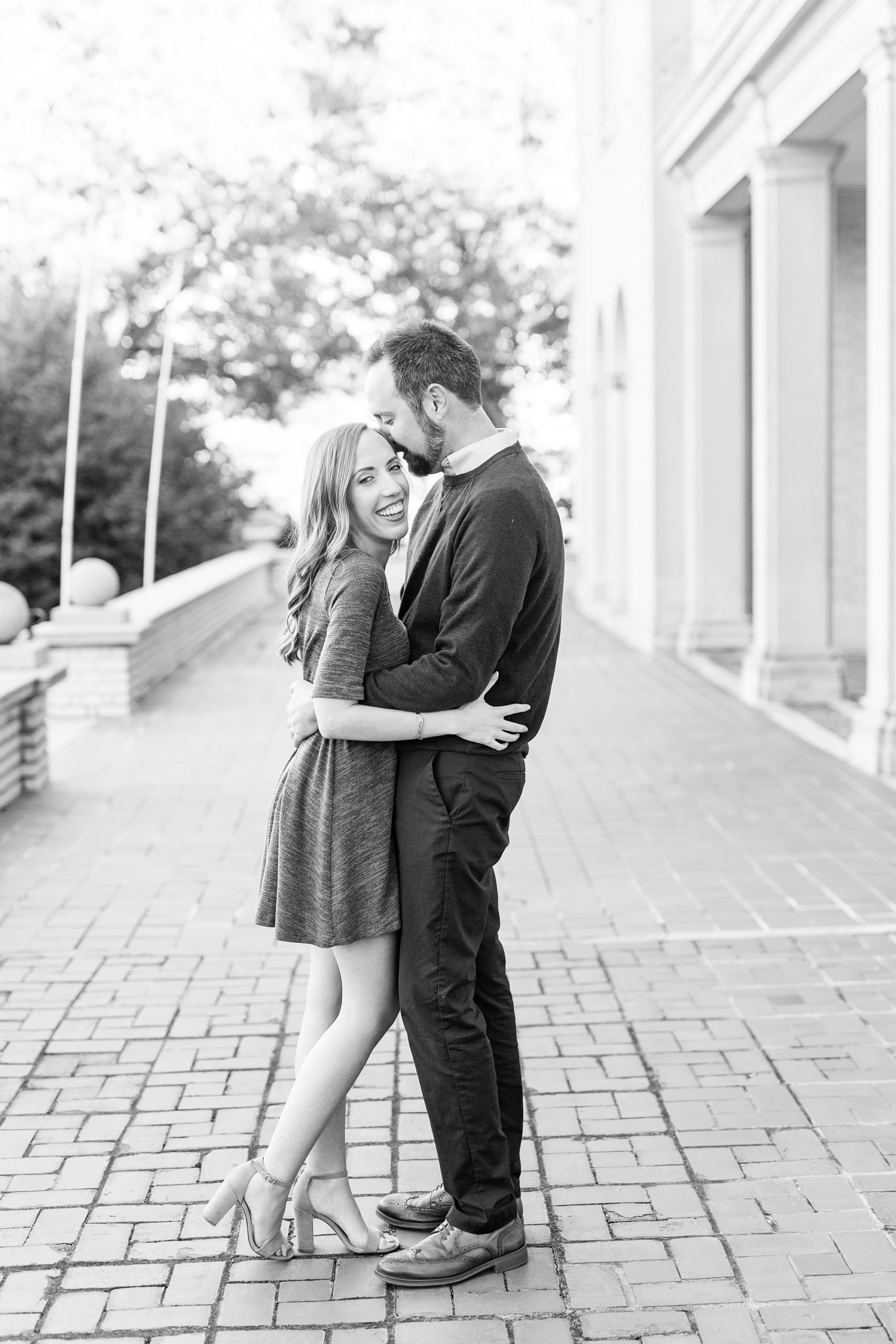groom makes bride laugh during Gastonia NC engagement session