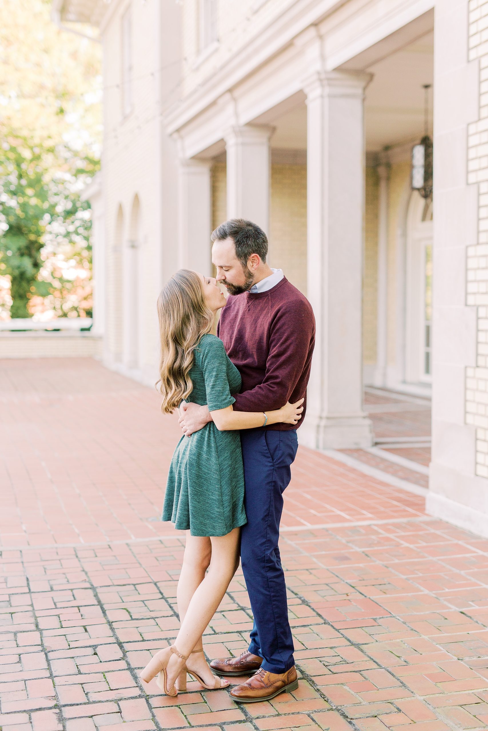 engaged couple kisses during Gastonia NC engagement session