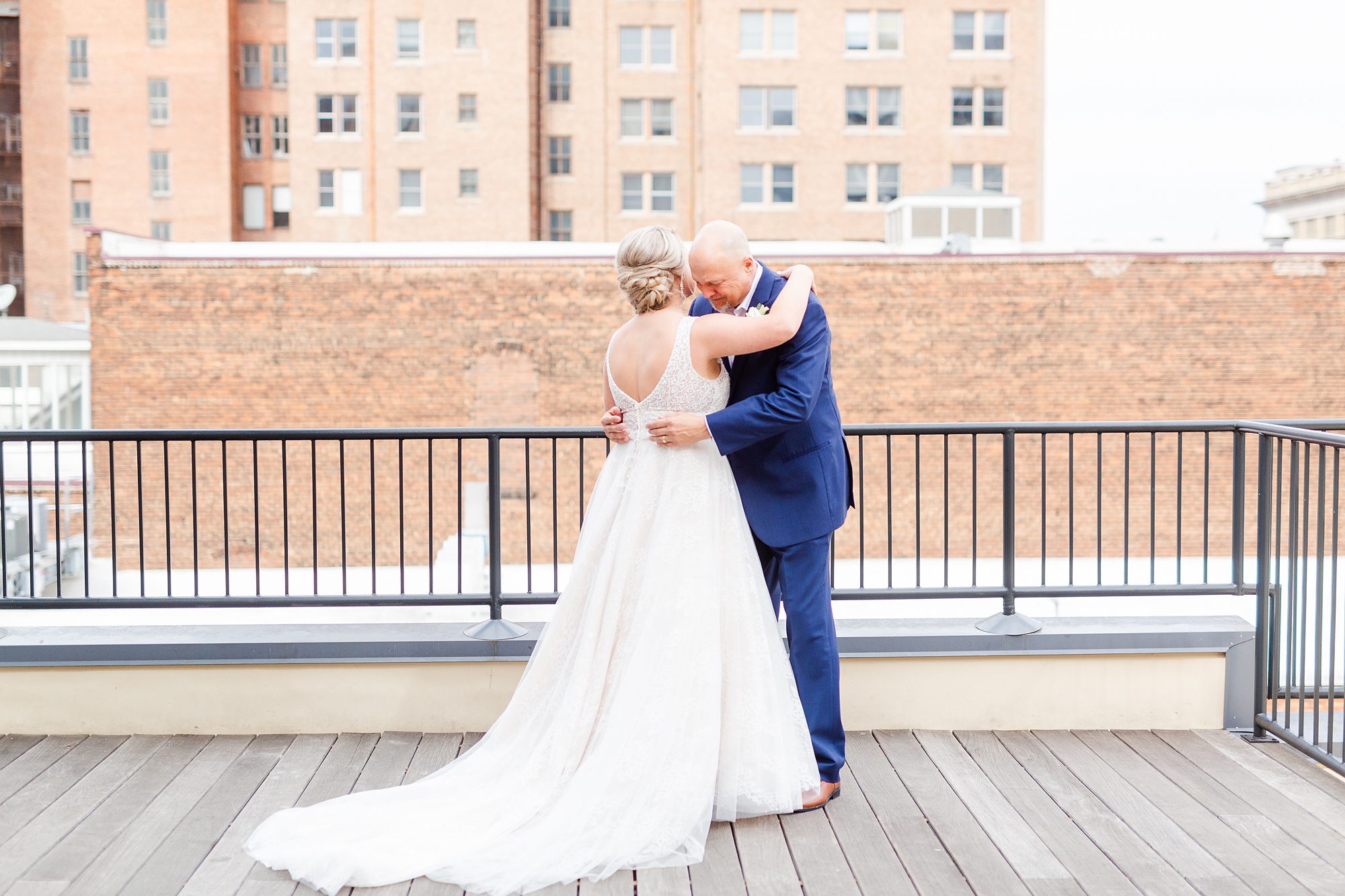 bride and dad have first look during Raleigh wedding day