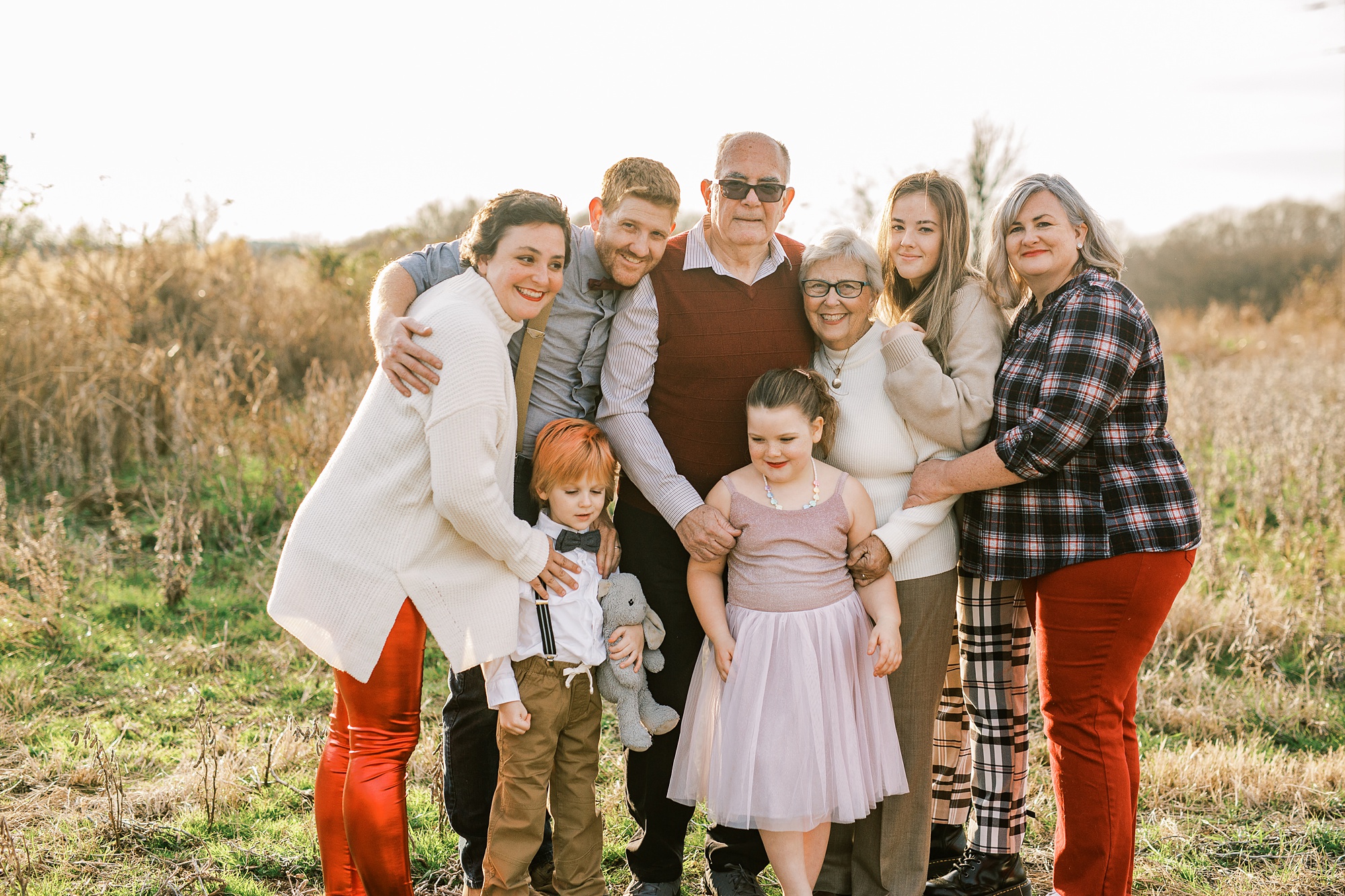 family poses with grandparents celebrating 50th anniversary