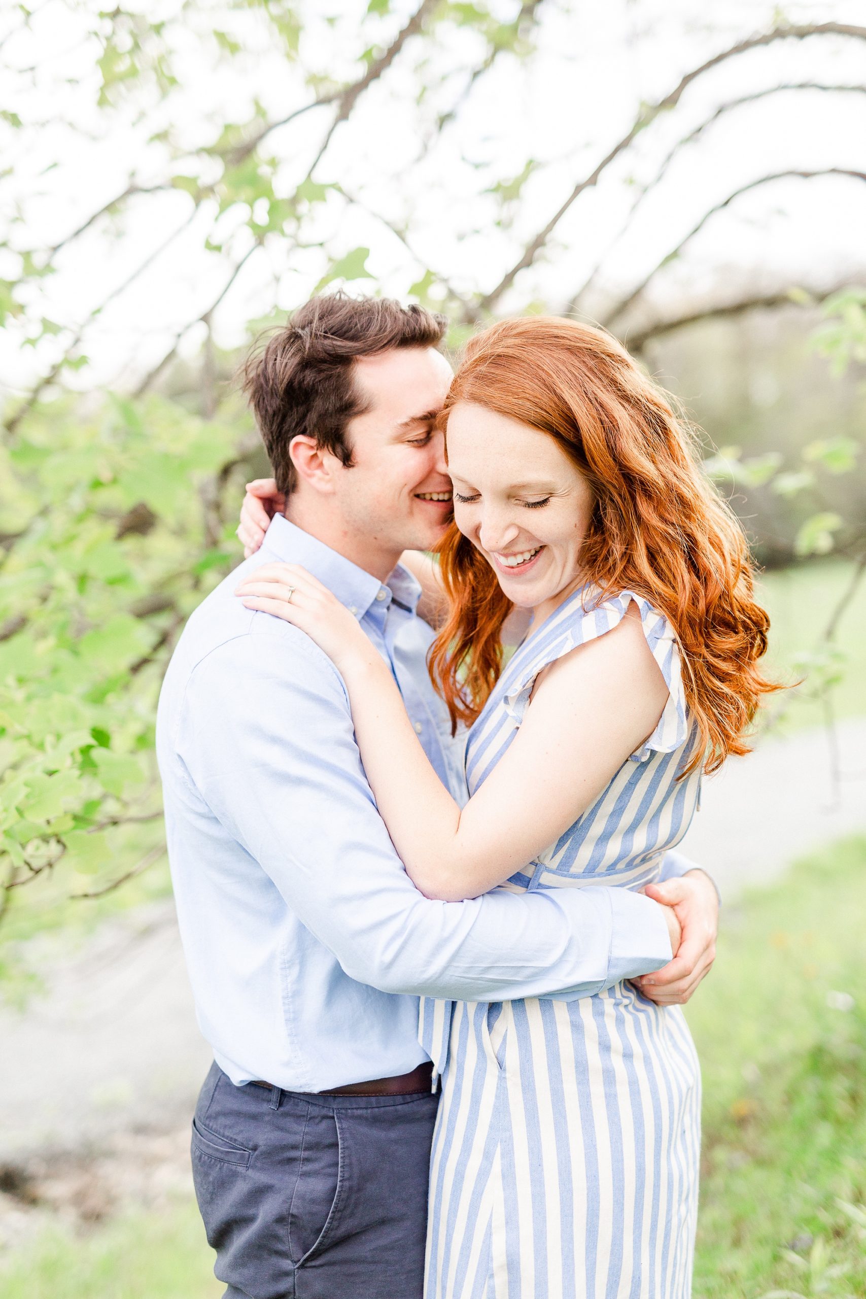 bride and groom laugh during Boone NC spring engagement photos