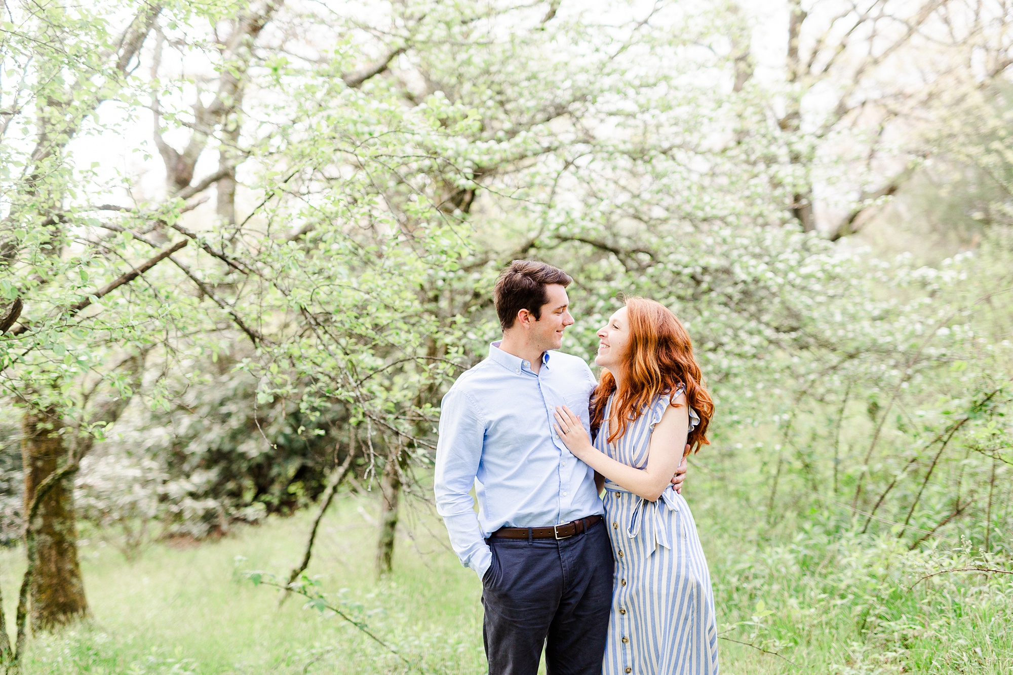 spring engagement session in Boone NC with bride in blue striped dress