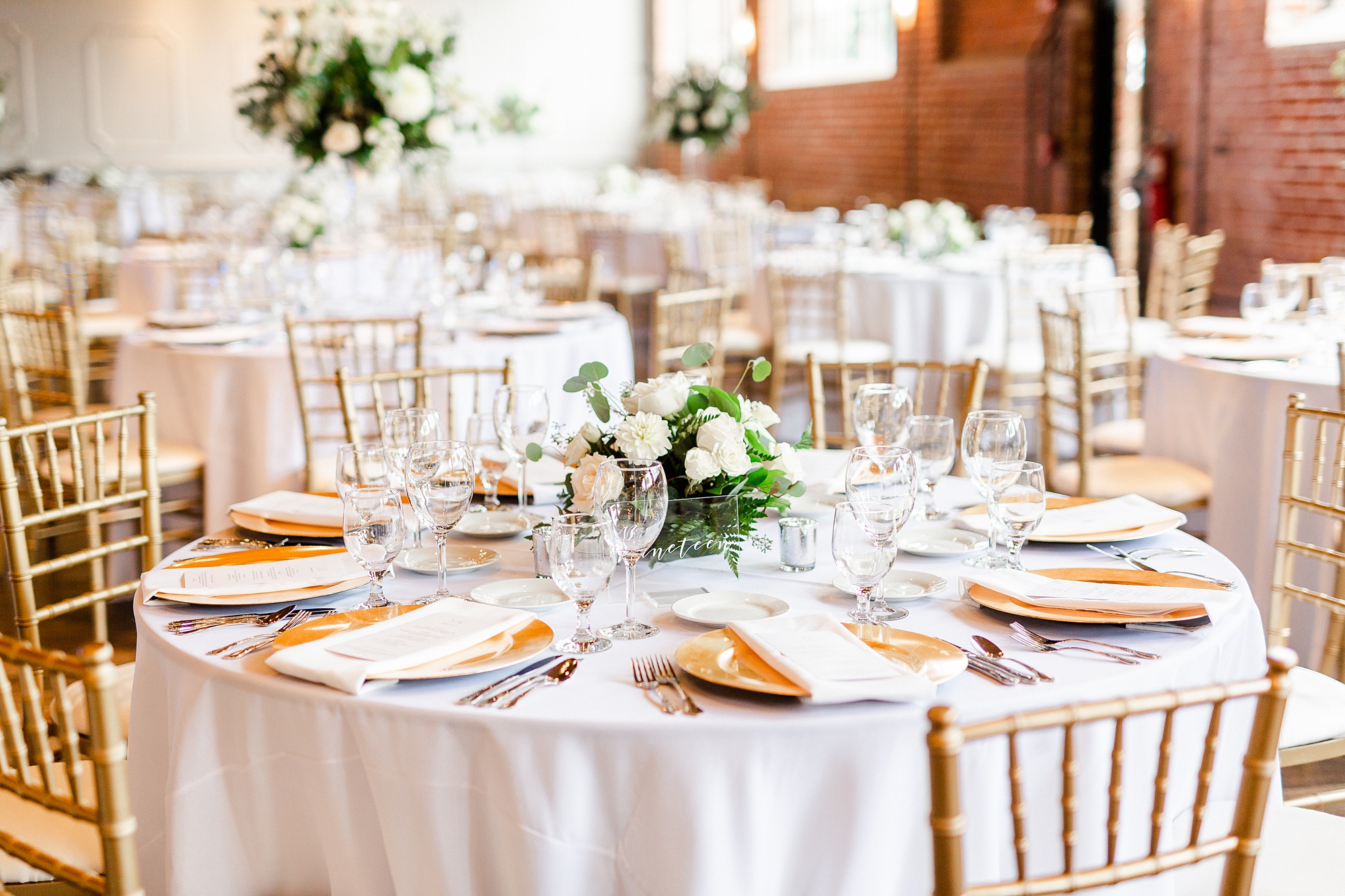 elegant wedding reception at Byron's South End with gold details