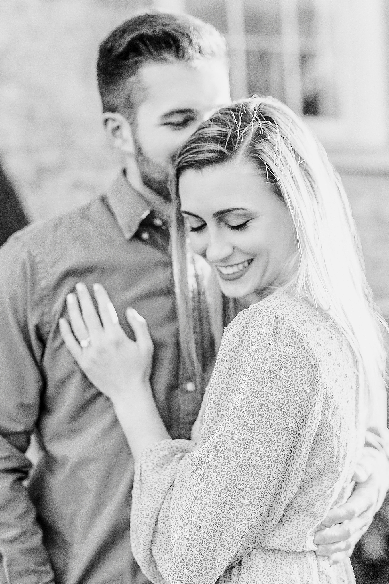bride looks over shoulder during NC engagement photos