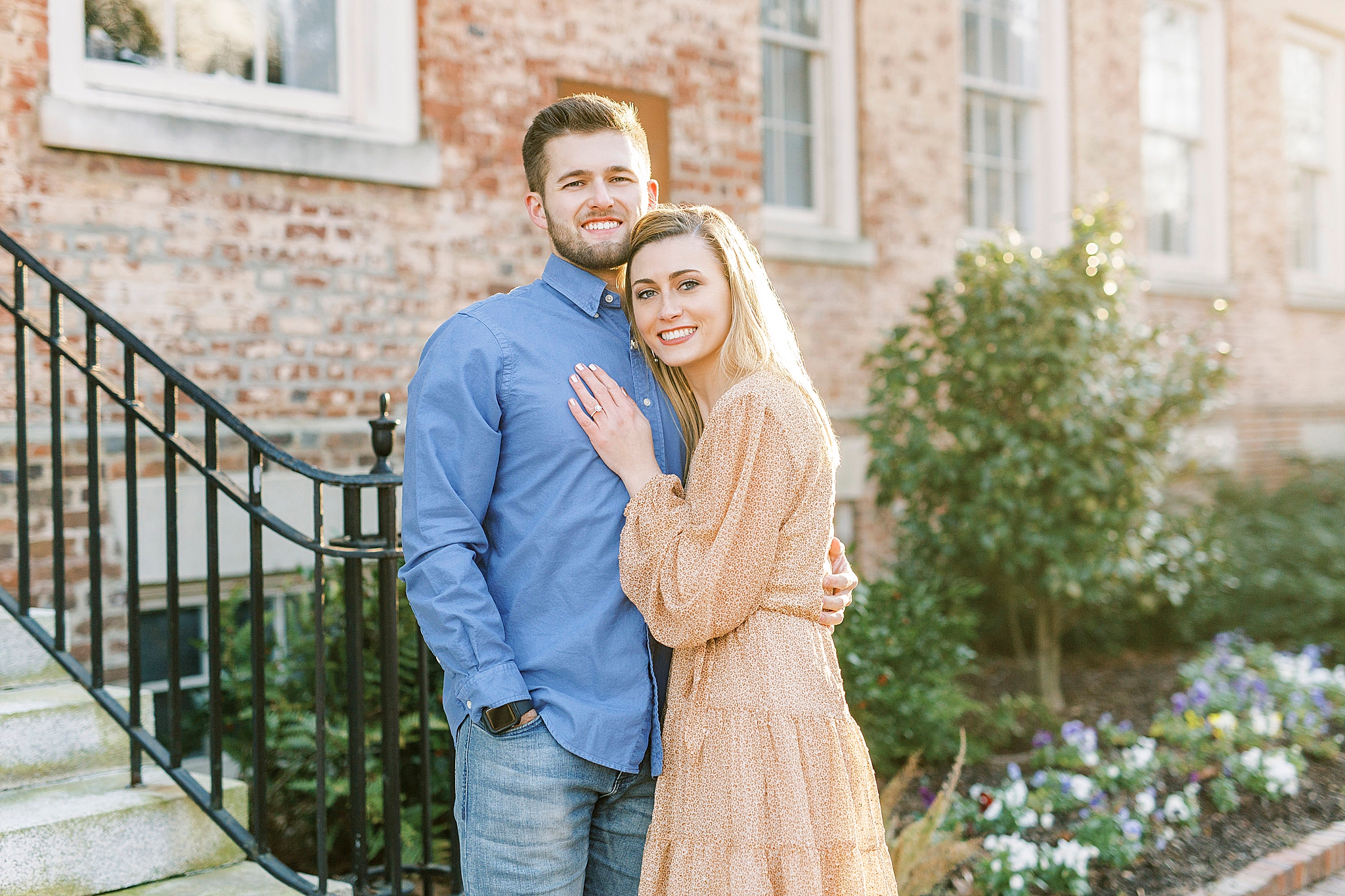 bride leans against groom's chest during Chapel Hill engagement session