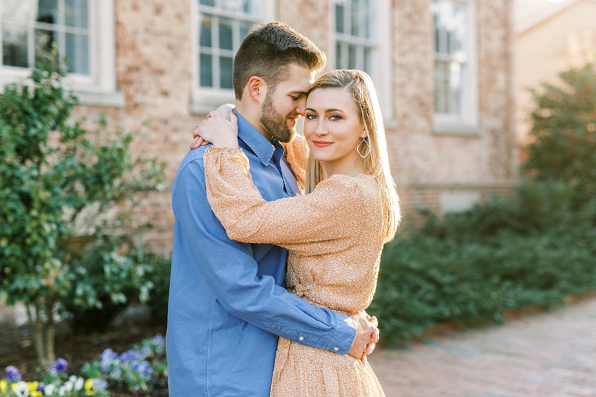groom nuzzles bride's cheek during Chapel Hill engagement session