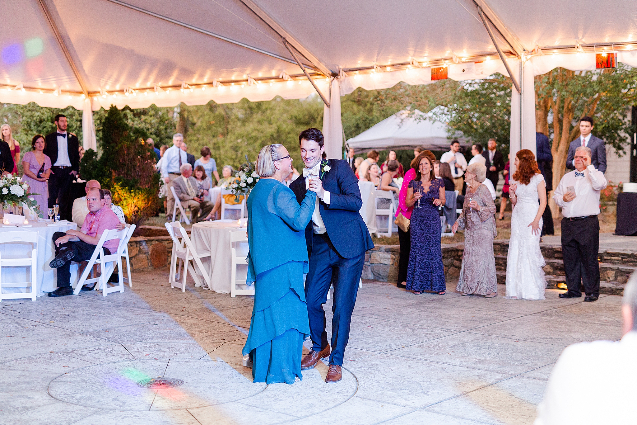 groom and mother dance at Lake O' The Woods Plantation wedding reception