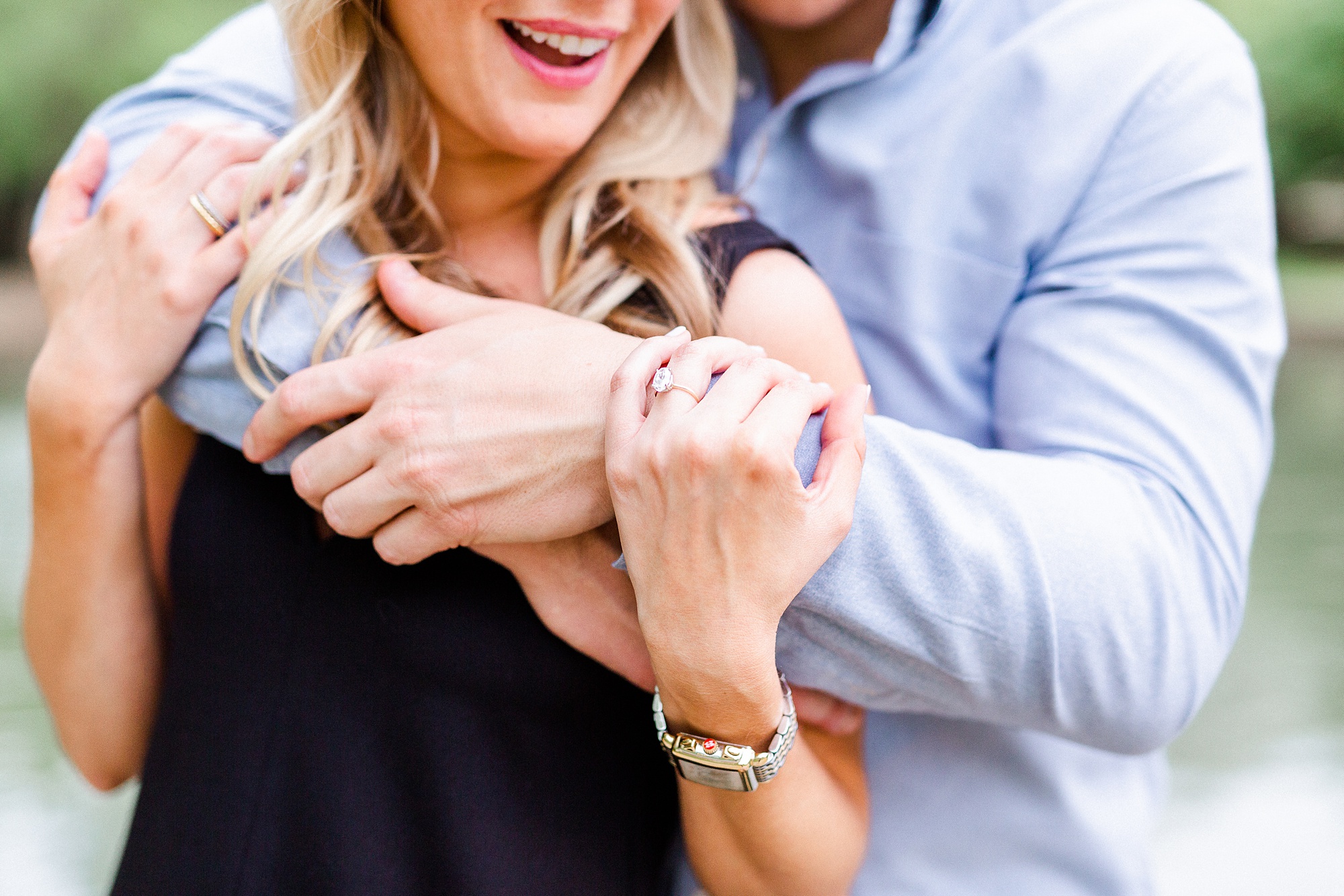 stylish Charlotte engagement photos with bride showing off ring