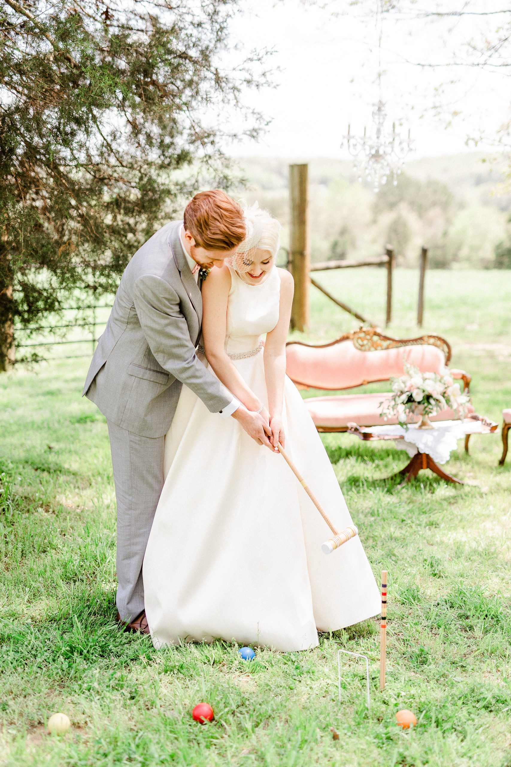 newlyweds play croquet at Carolina Country Weddings