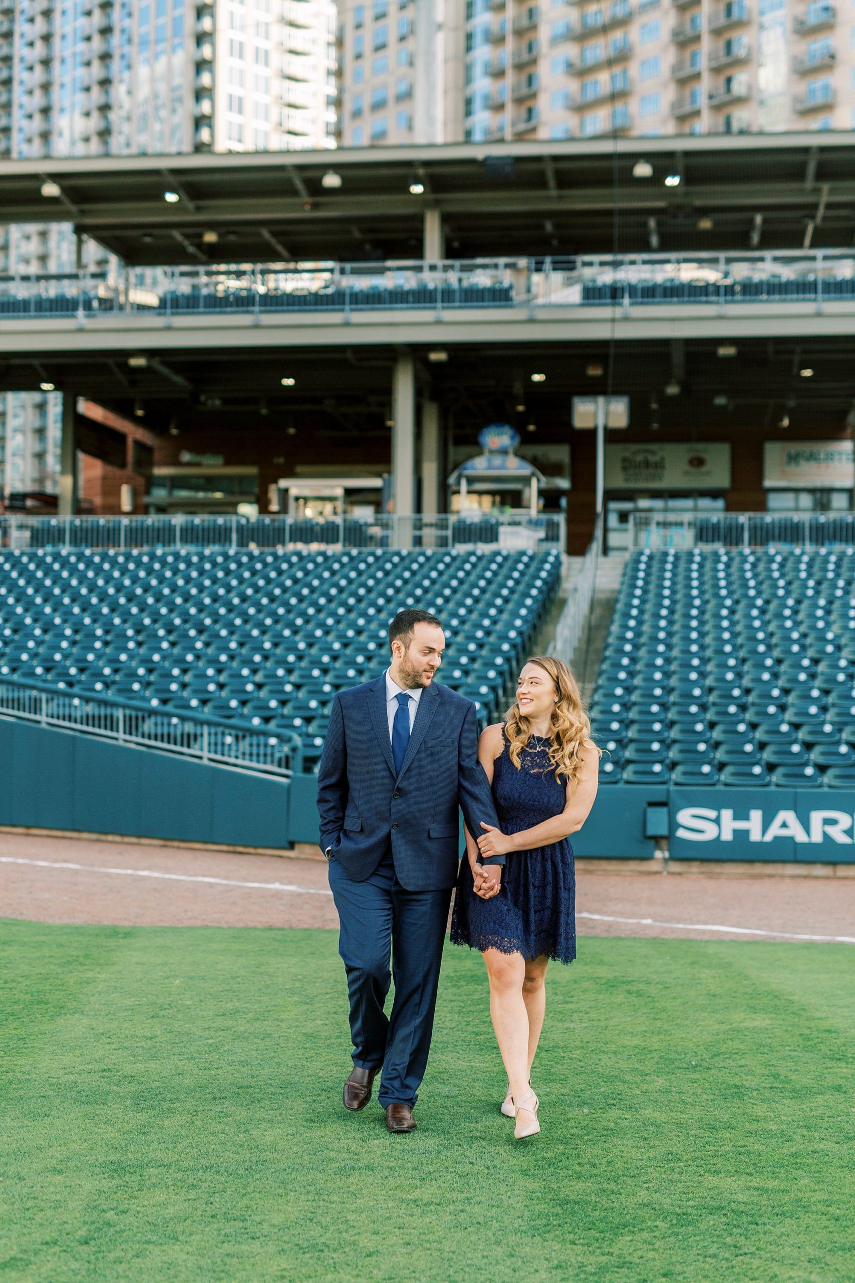 Truist Field engagement portraits for couple in Charlotte NC