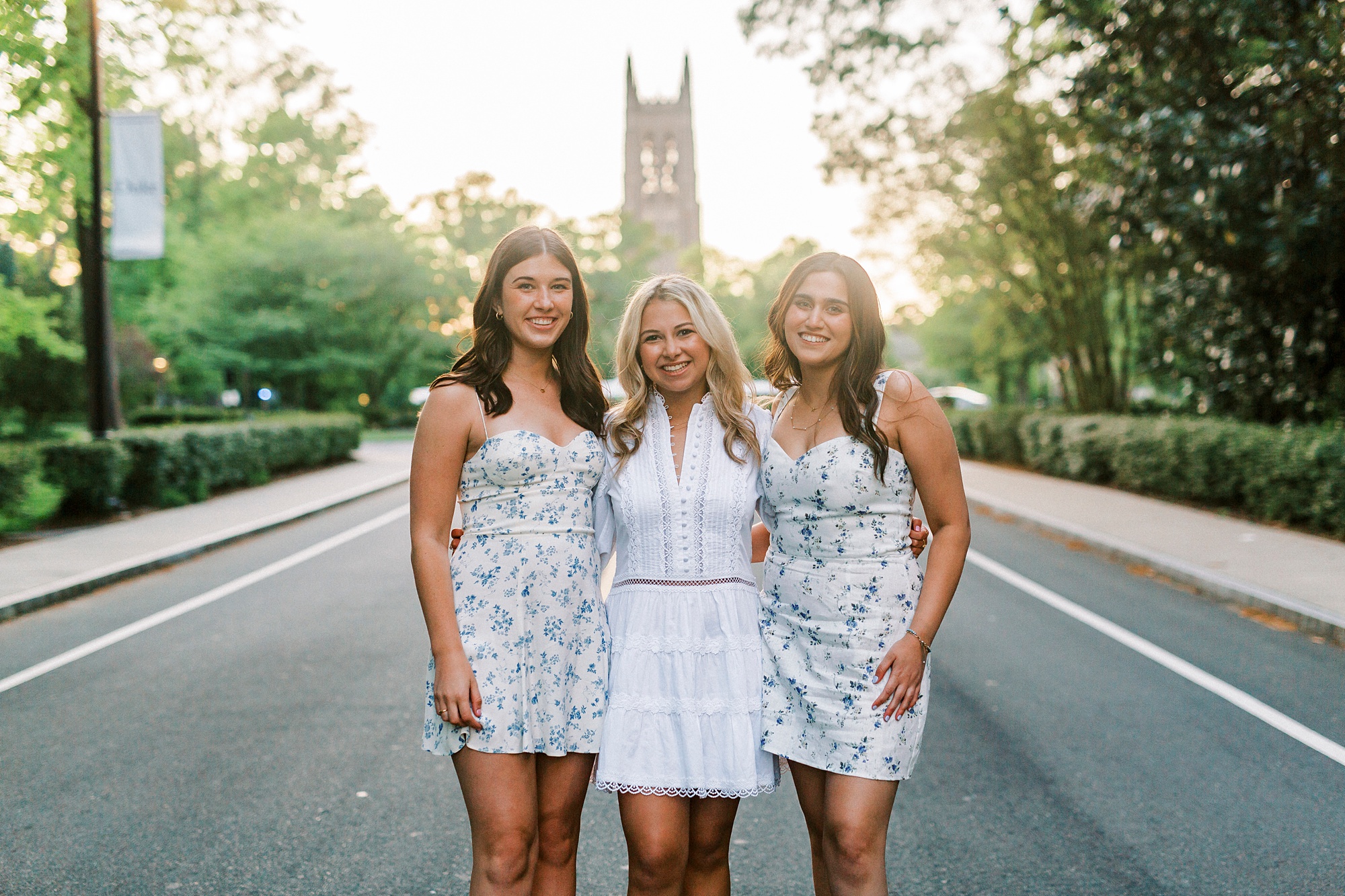 sunset Duke University graduation portraits for three girls