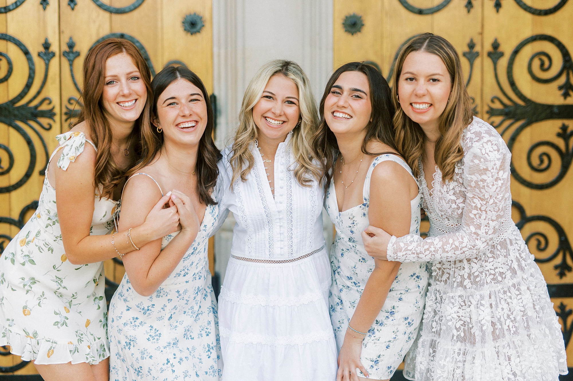 five girls pose by Duke Chapel door
