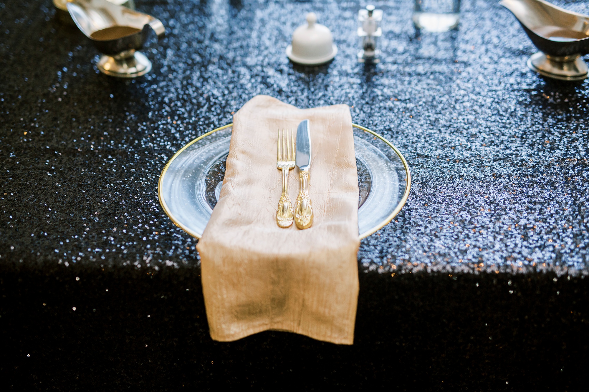 black and gold place settings for Great Gatsby birthday party