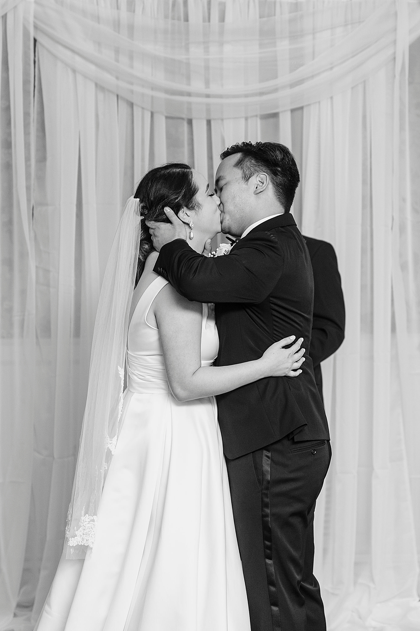 bride and groom kiss during Green Park Inn wedding ceremony
