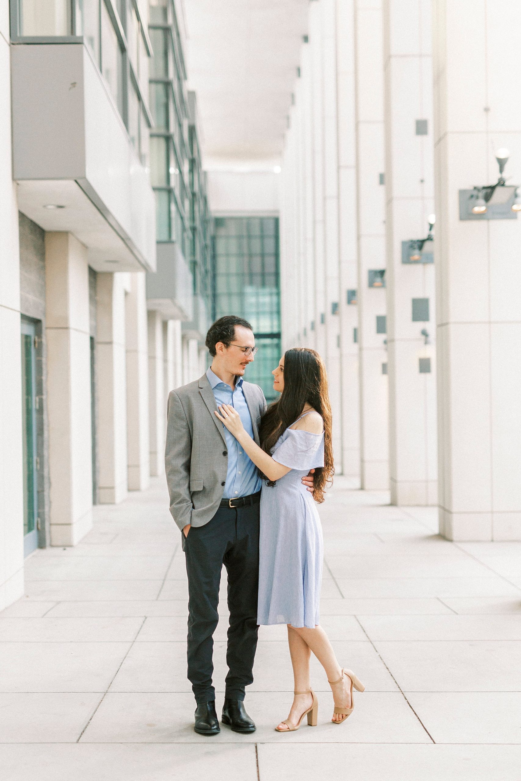 engaged couple walks through Convention Center