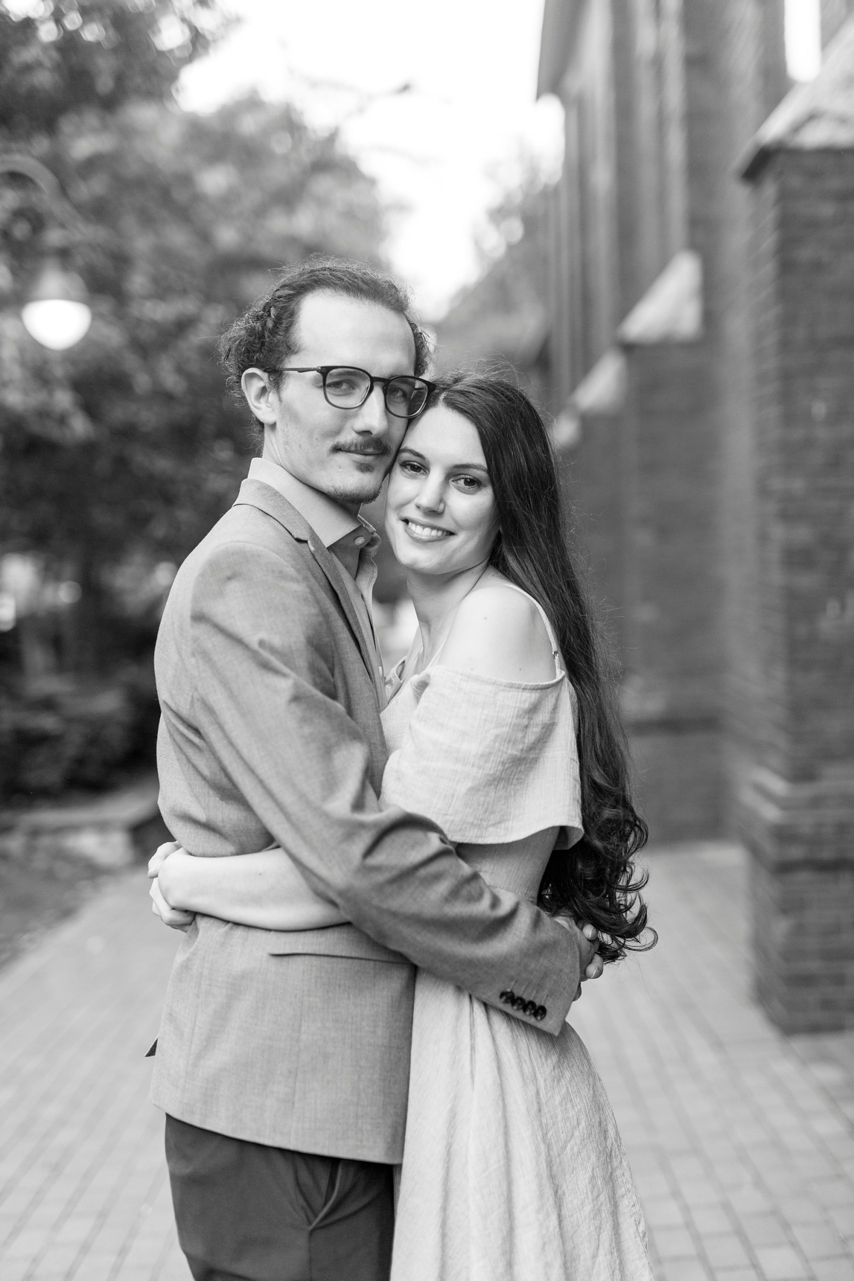 engaged couple hugs during Charlotte NC engagement photos