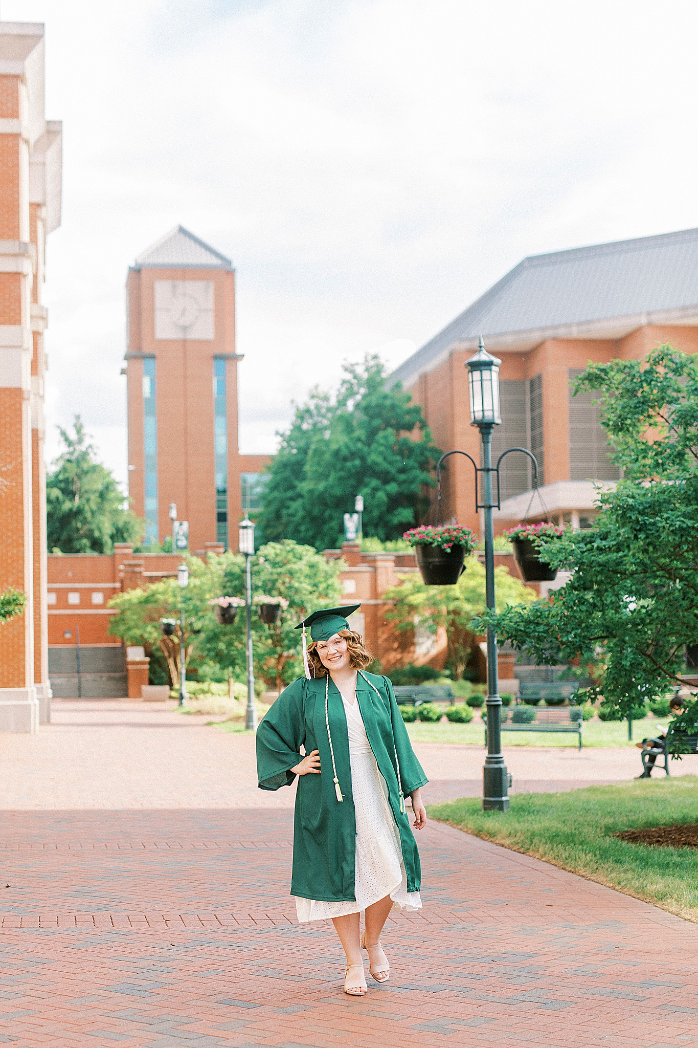 UNCC senior pictures with graduate in green gown