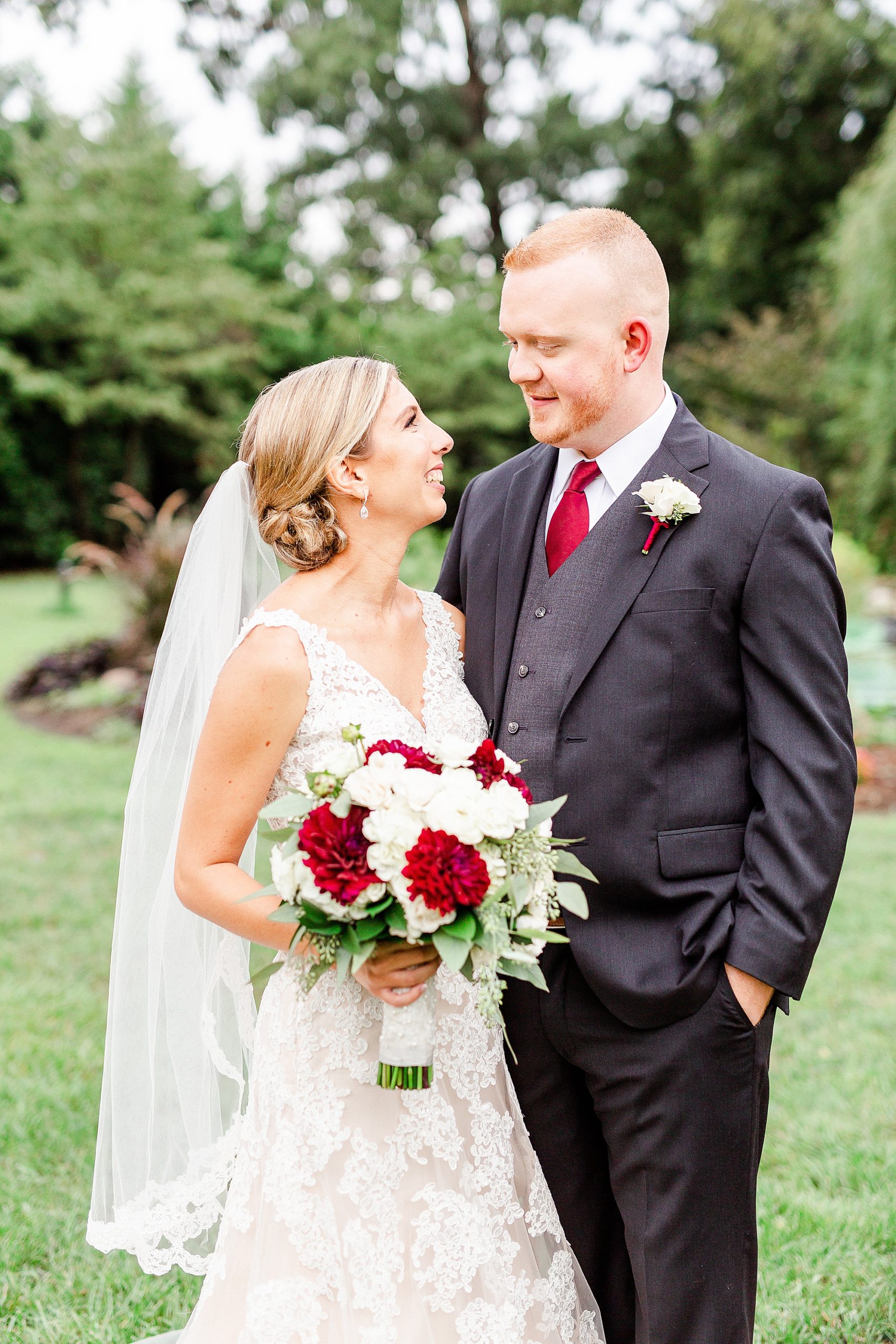 newlyweds look at each other during Charlotte NC wedding photos