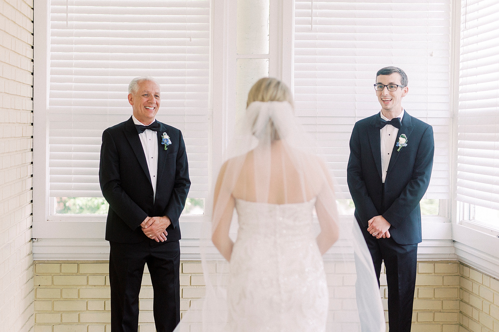 first look with bride, dad and brother