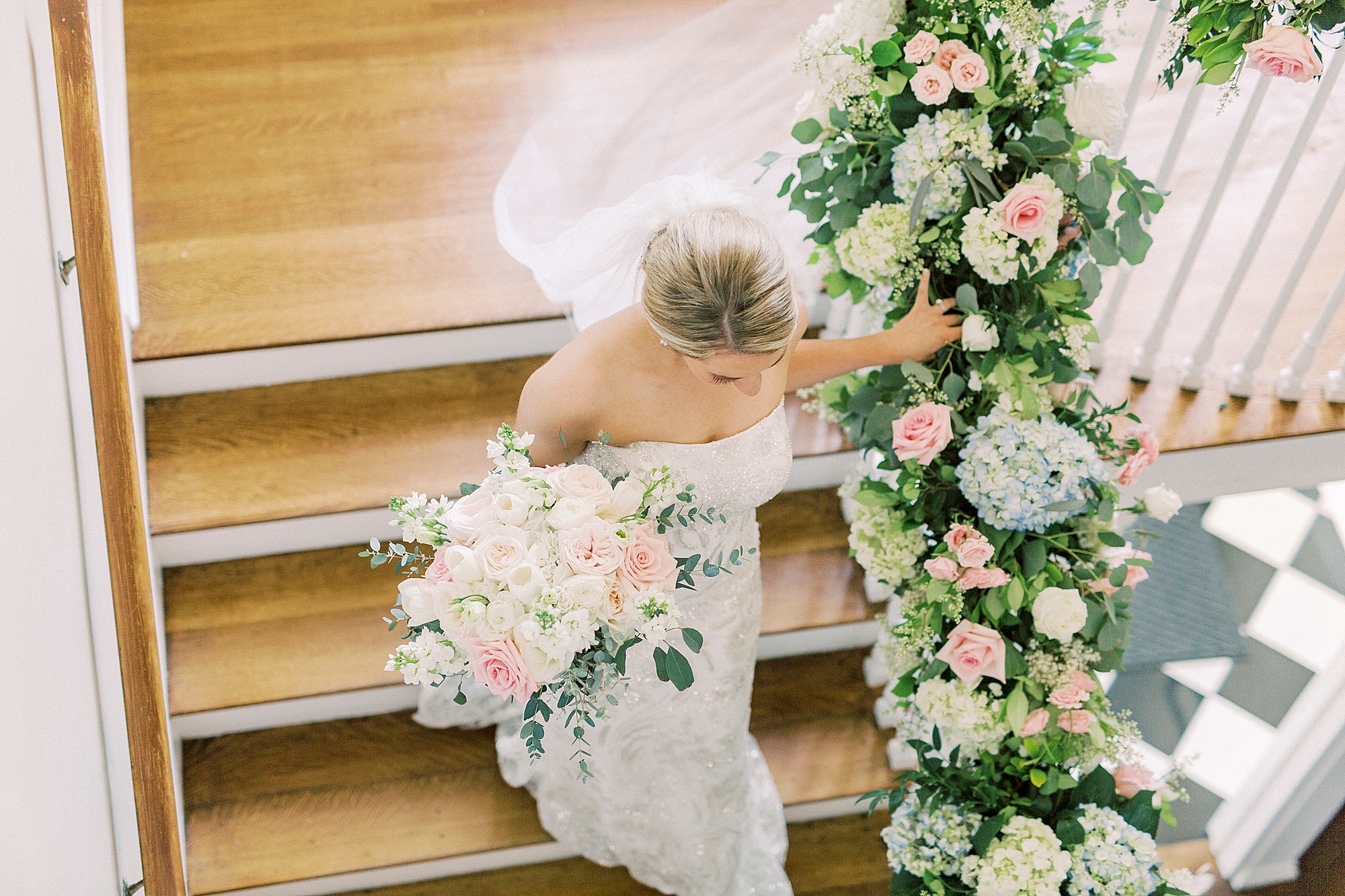 bride walks down staircase in Separk Mansion