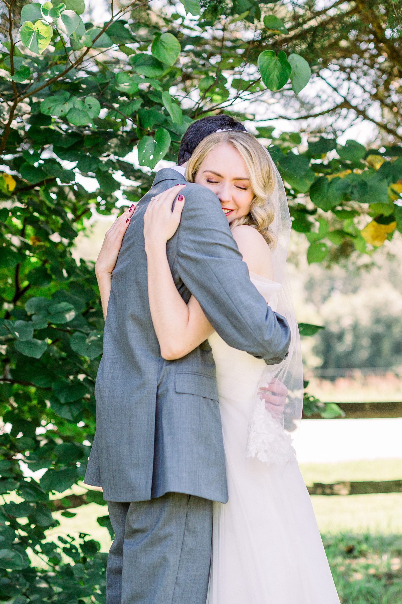 bride and groom hug during first look in Harmony NC