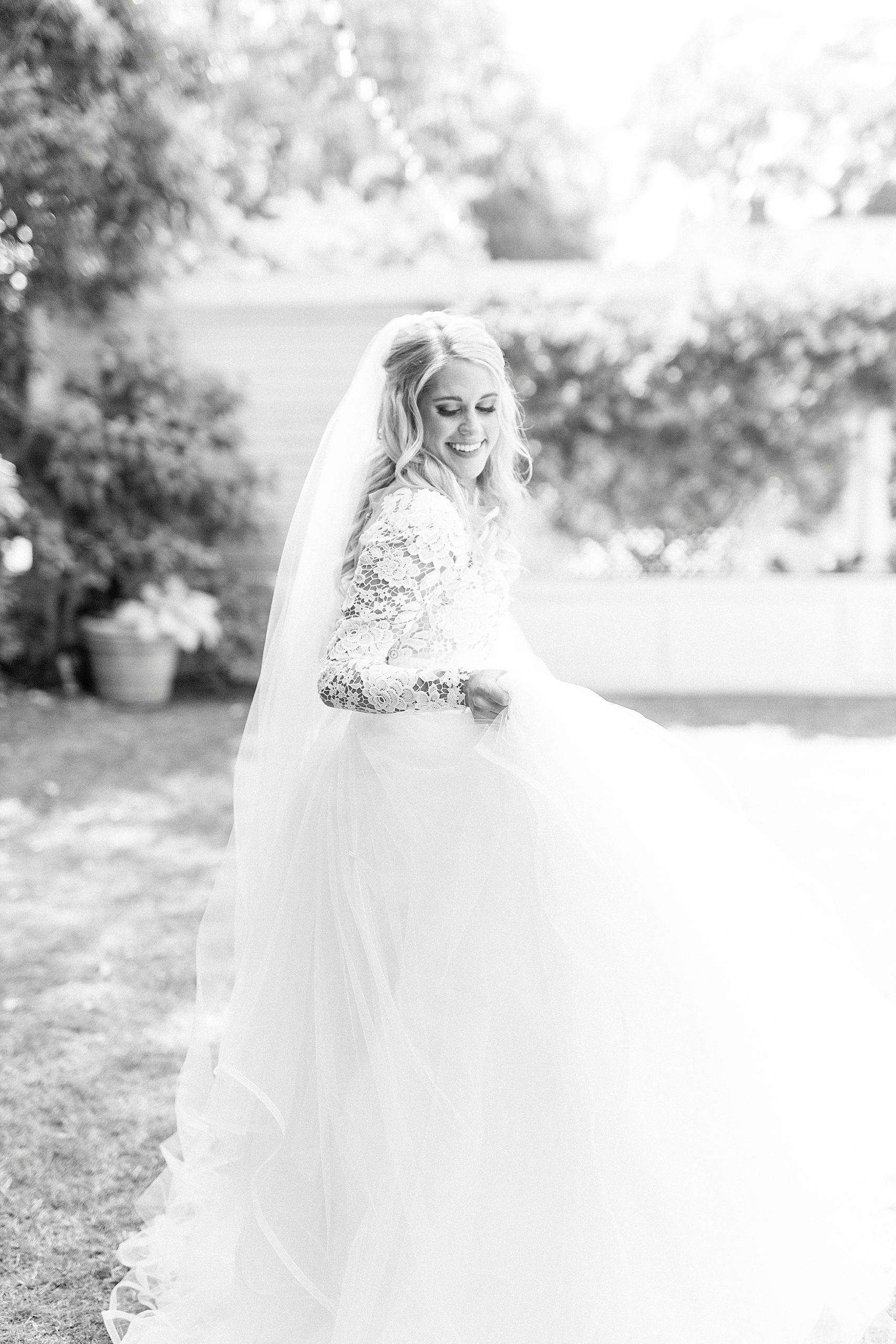 bride walks through garden at Separk Mansion