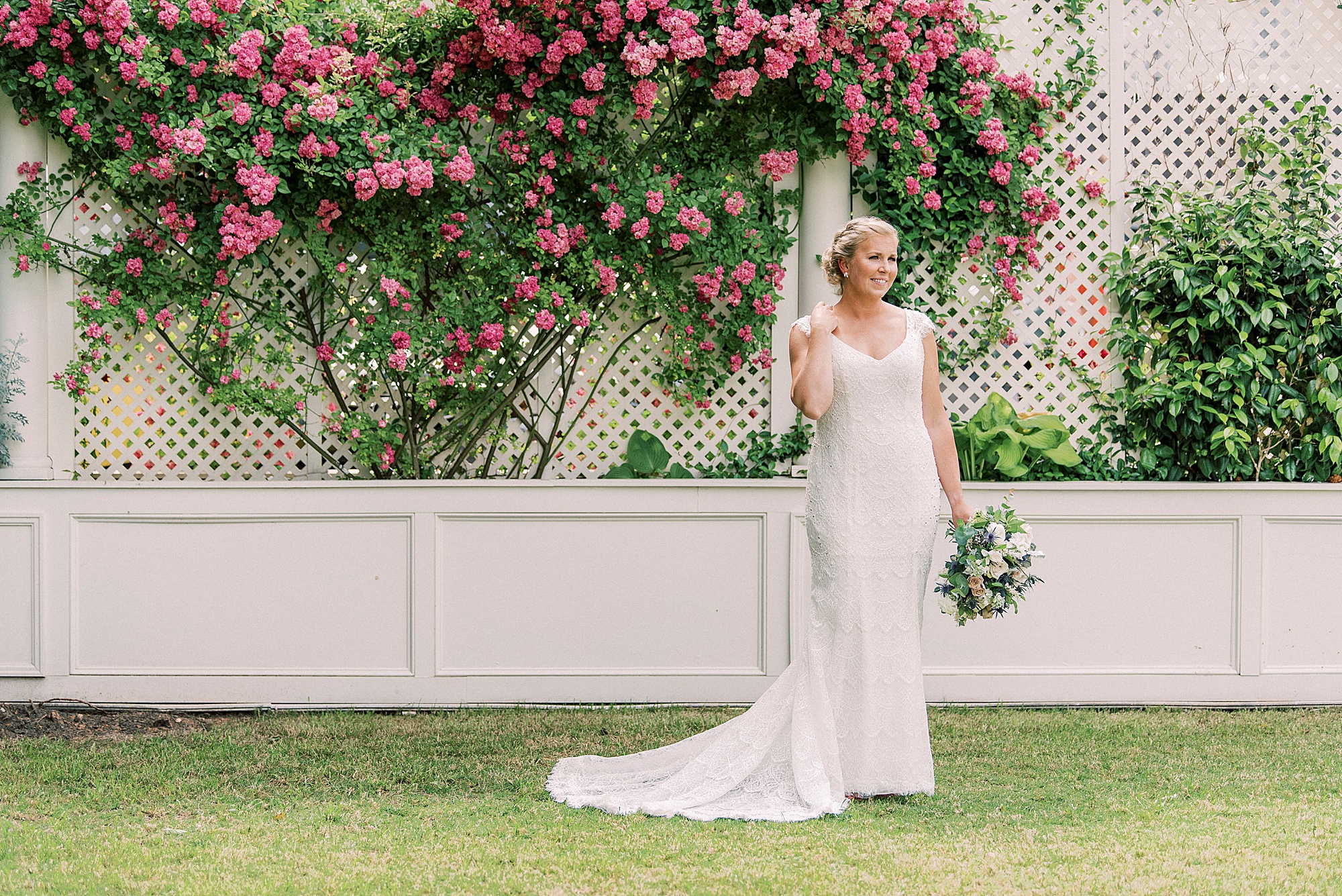 bride poses in gardens at Separk Mansion