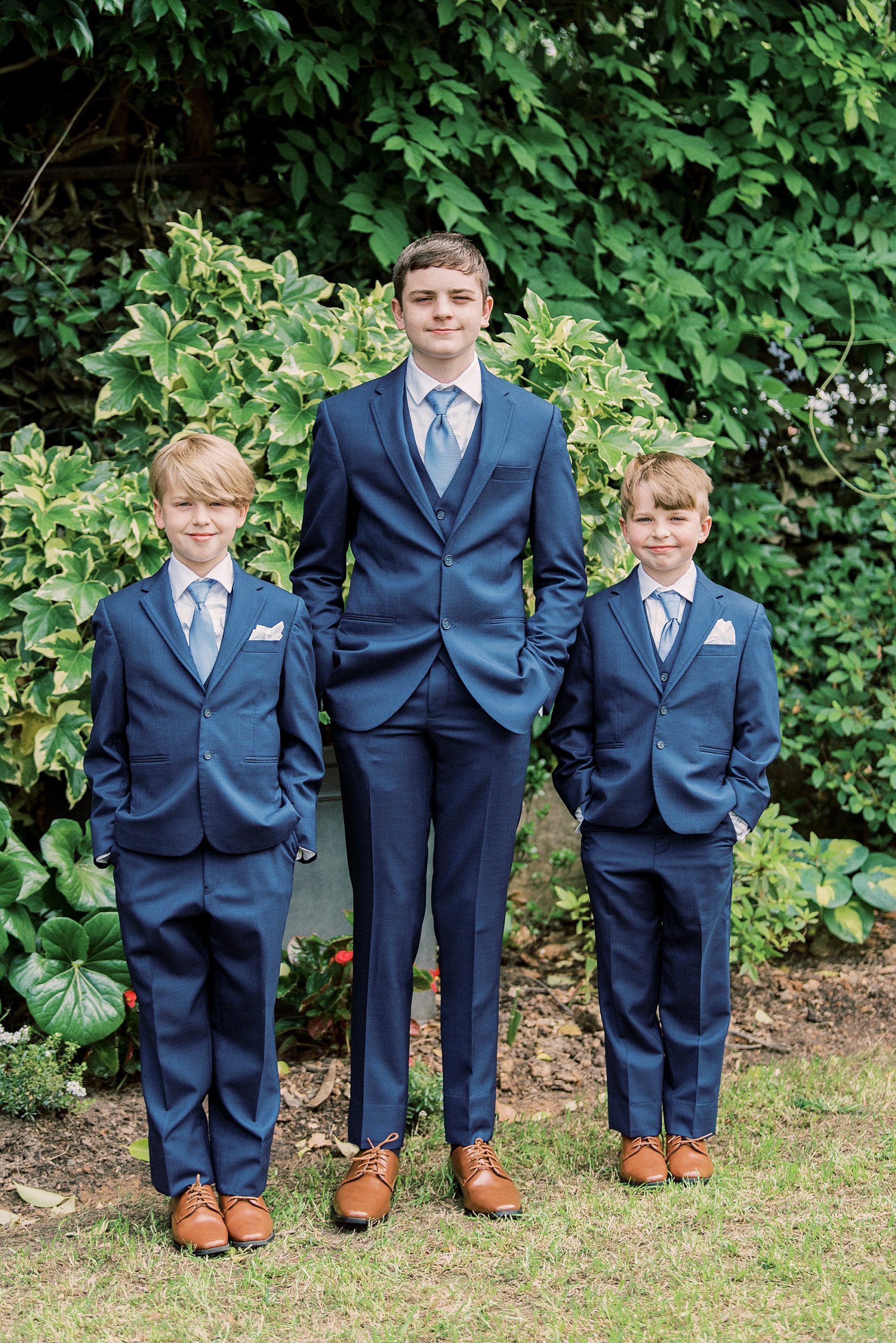 three boys pose in navy suits for Separk Mansion wedding with kids