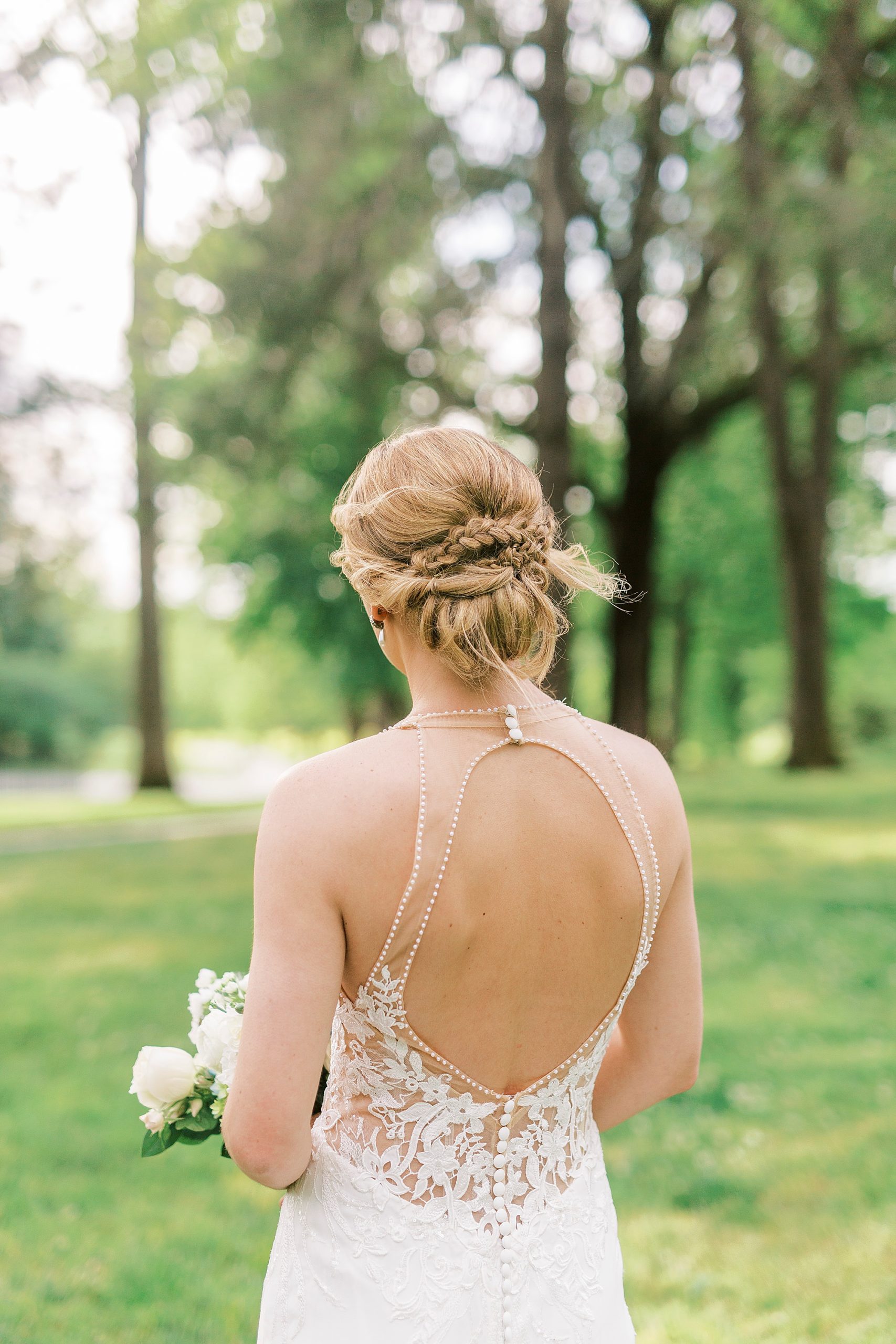bride's braided updo for spring wedding