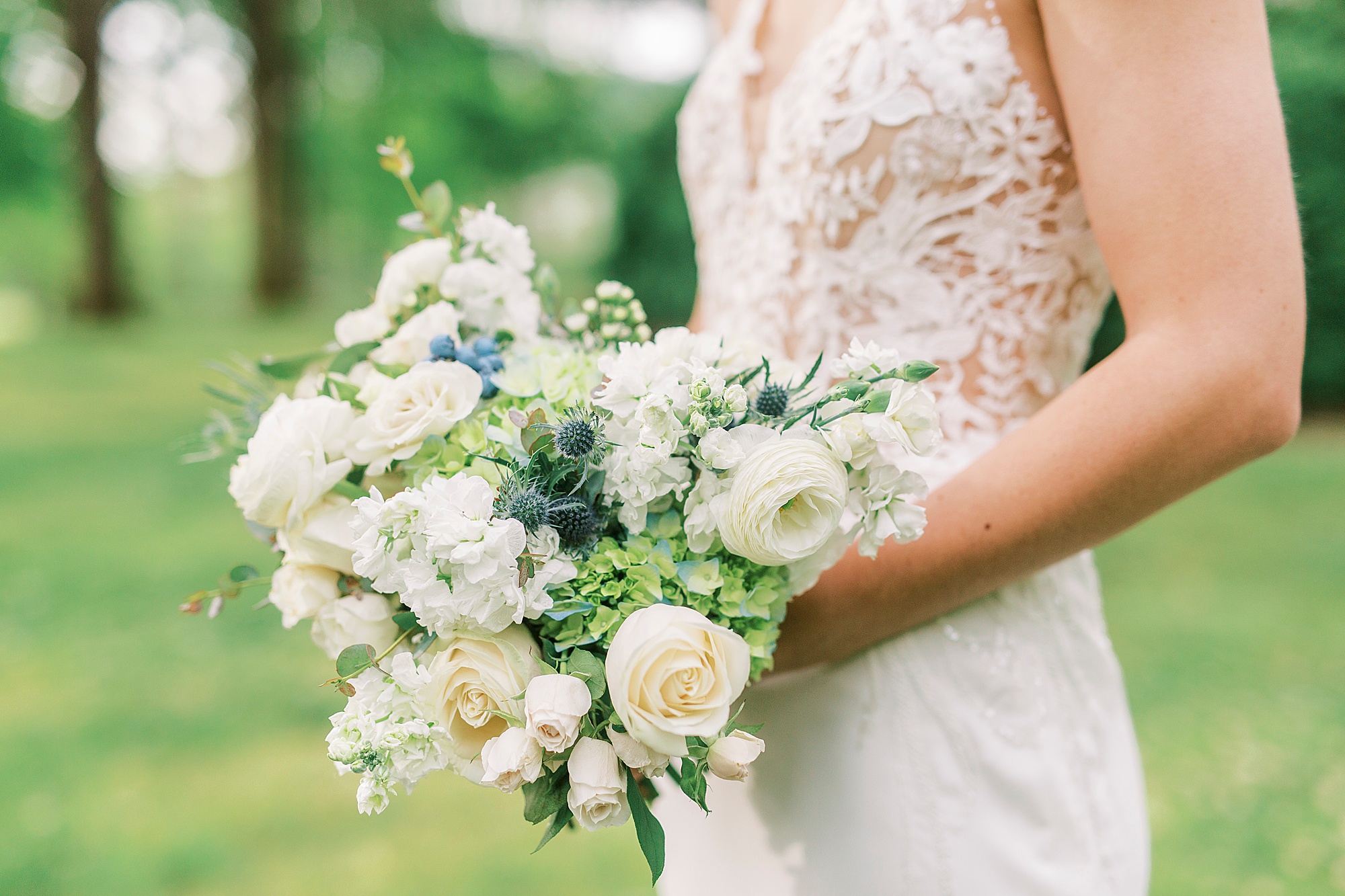 bride's white and green bouquet for spring wedding