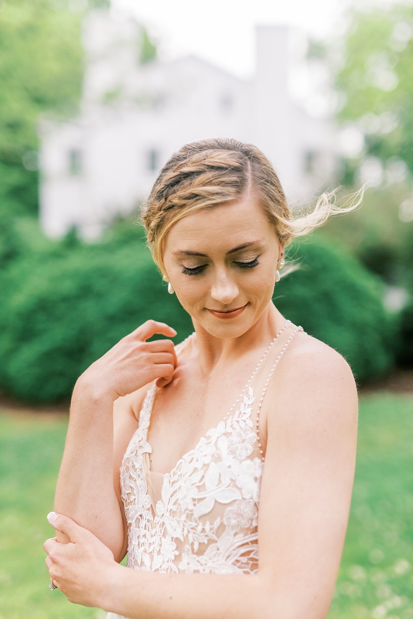 bride looks over shoulder during Tanglewood bridal portraits