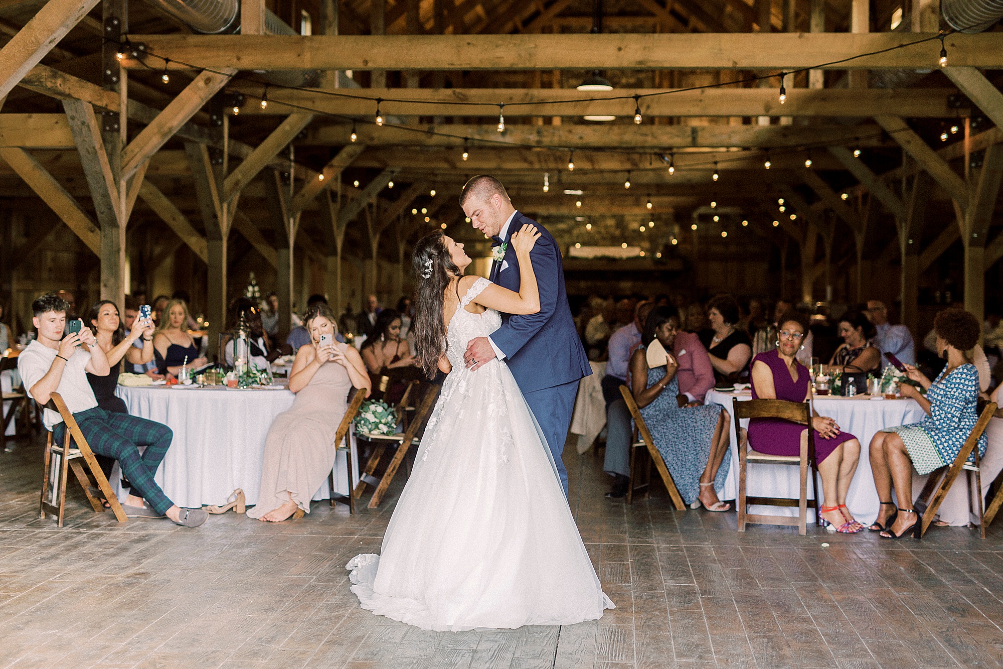 newlyweds have first dance at The Farmstead