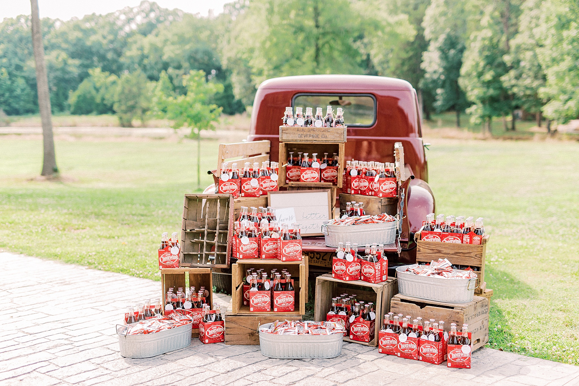 vintage red truck with Cheerwine wedding favors in back