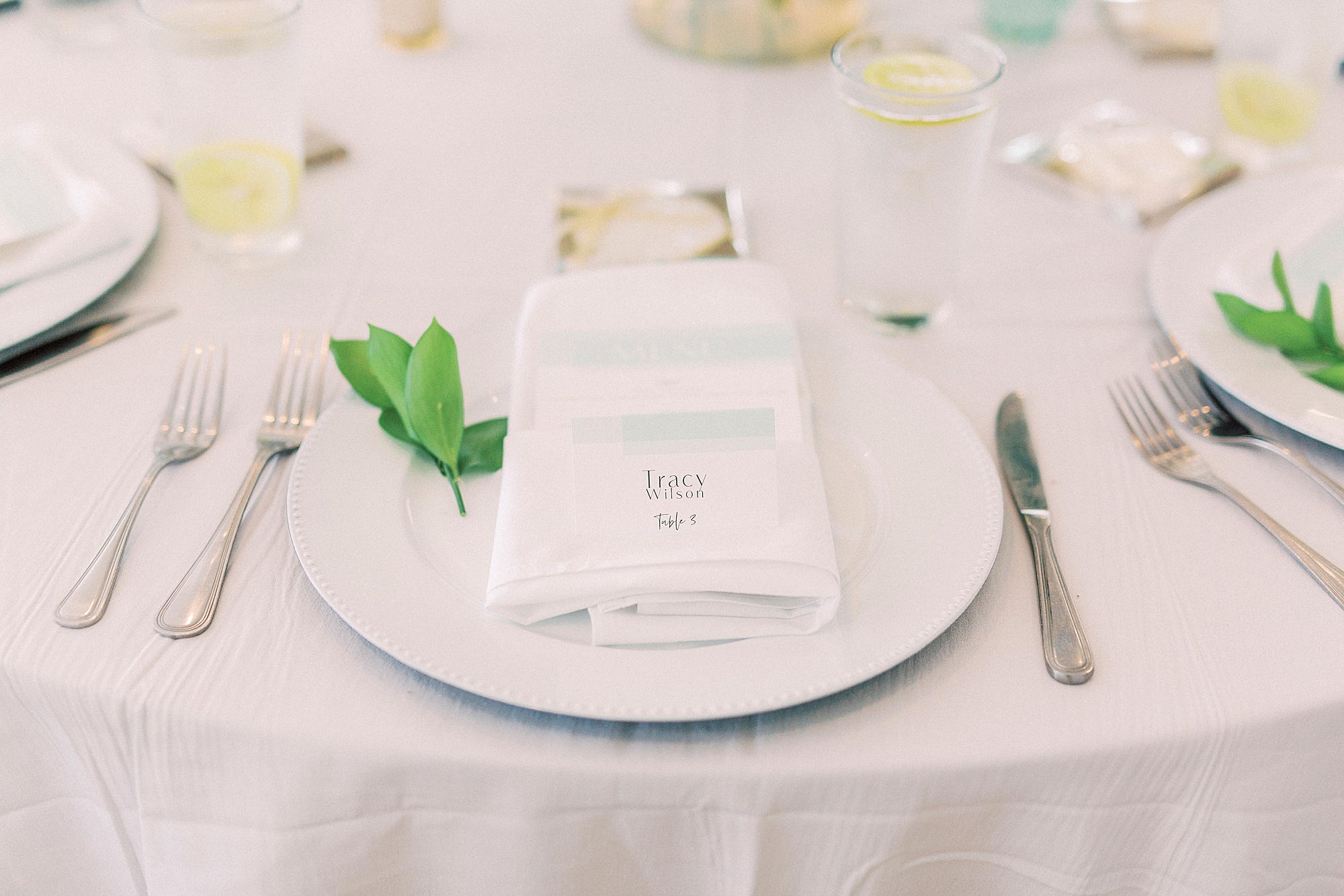 napkins folded on plates for Oceanic Restaurant wedding reception