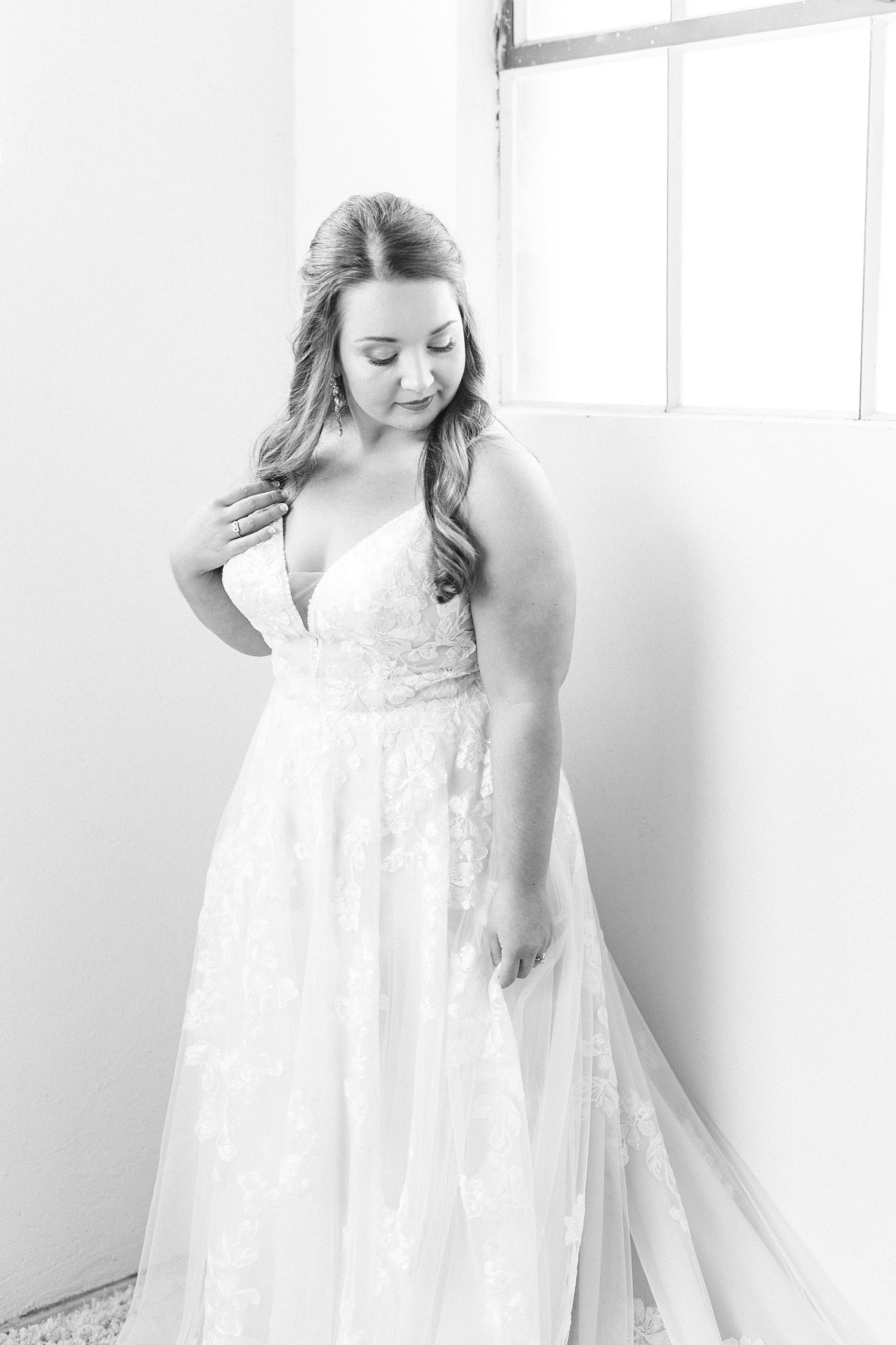 black and white portrait of bride at Cadillac Service Garage