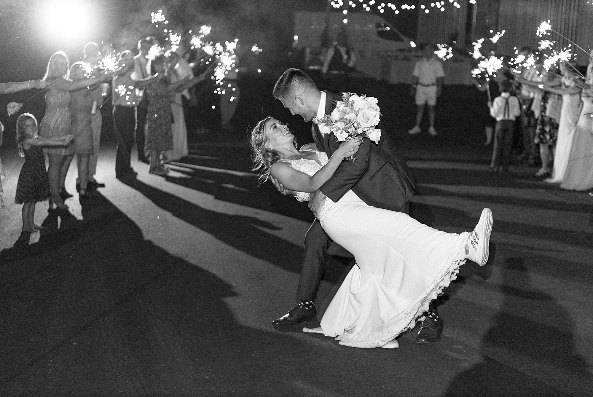 newlyweds dip during sparkler exit