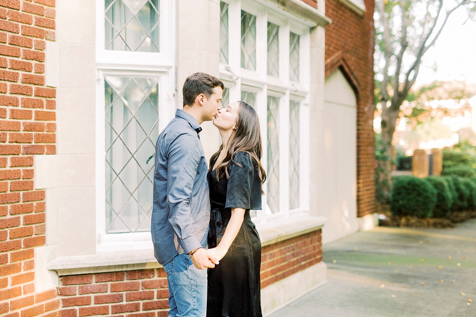 engaged couple kisses during Concord NC engagement session