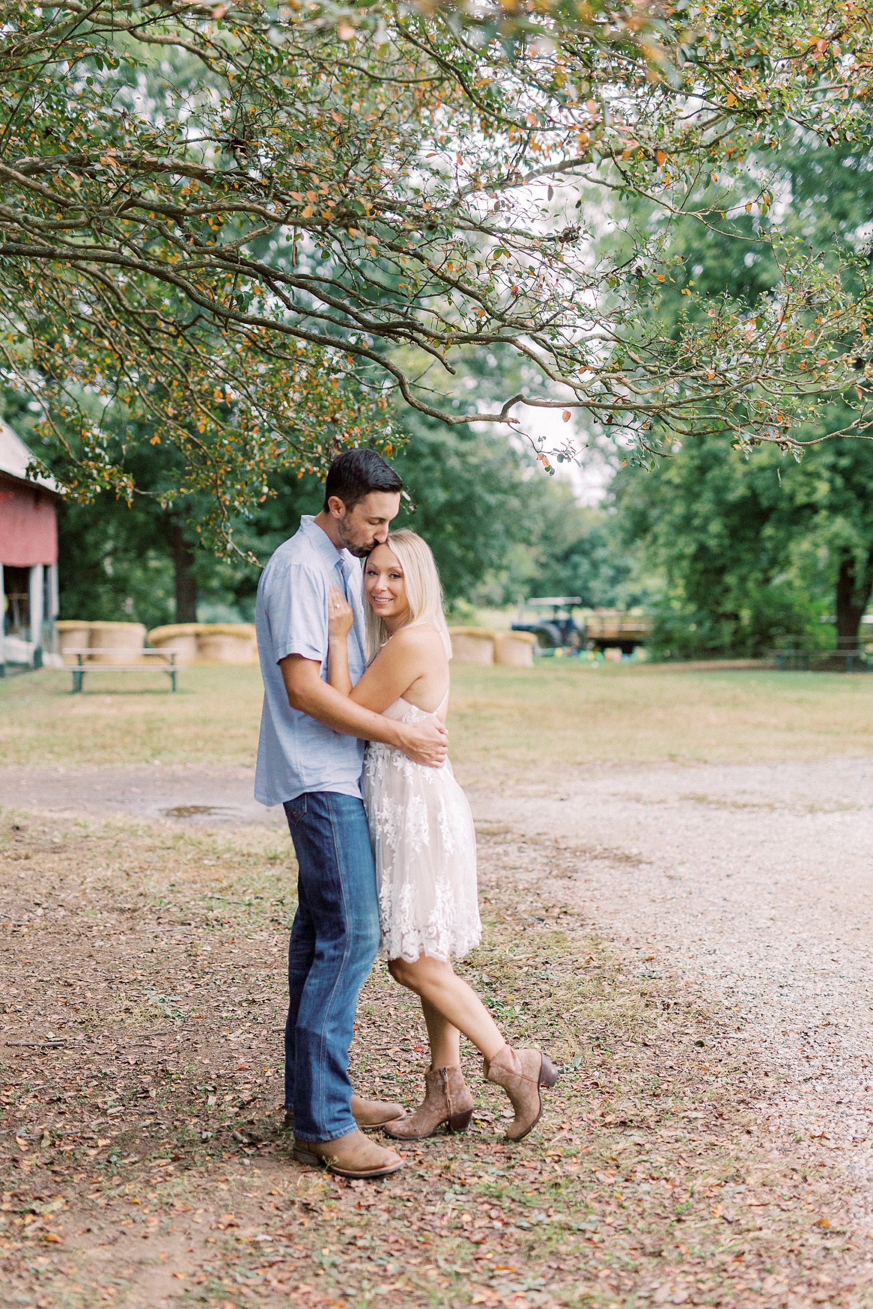 bride and groom hug during Hodges Family Farm engagement photos
