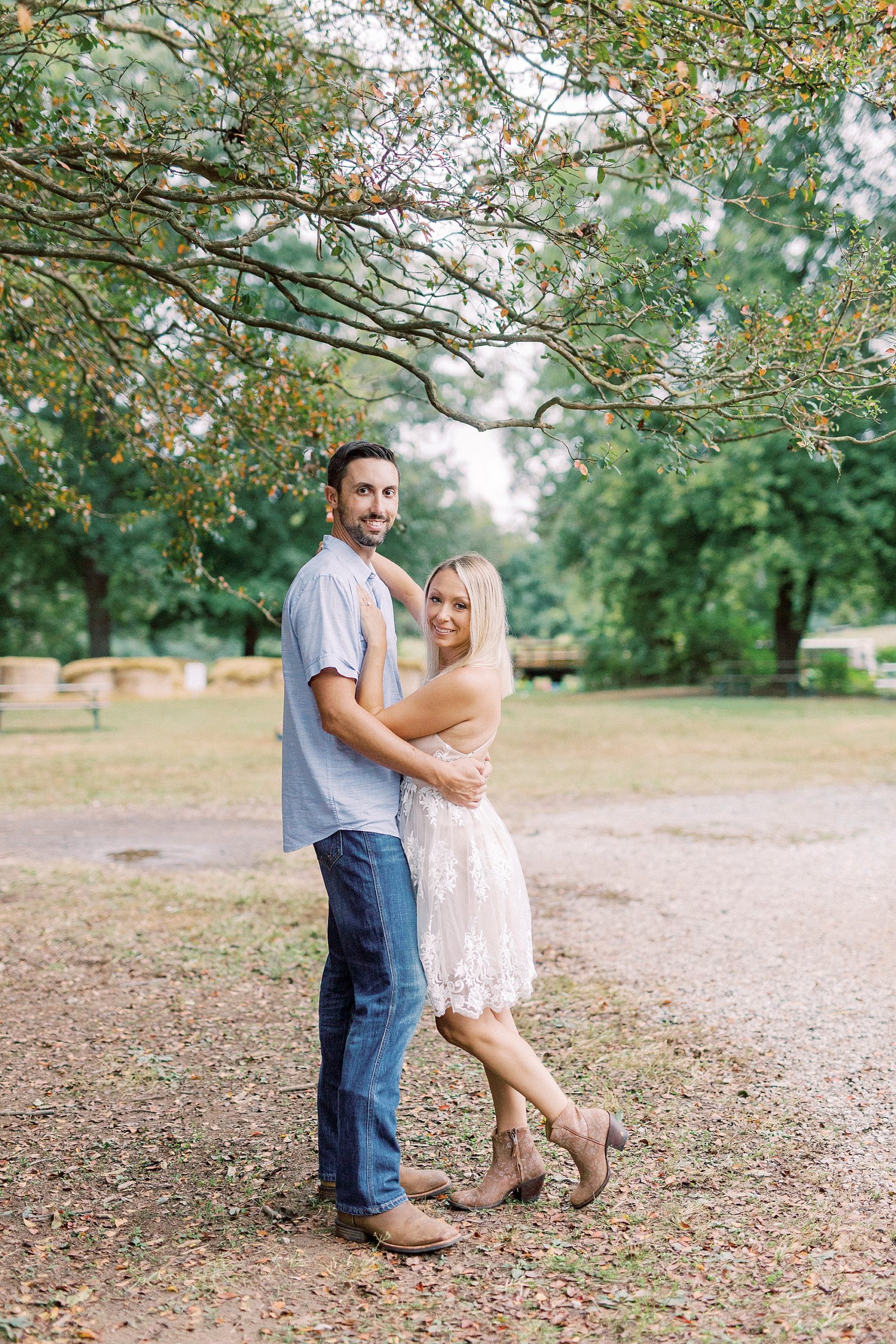 couple hugs during Hodges Family Farm engagement session
