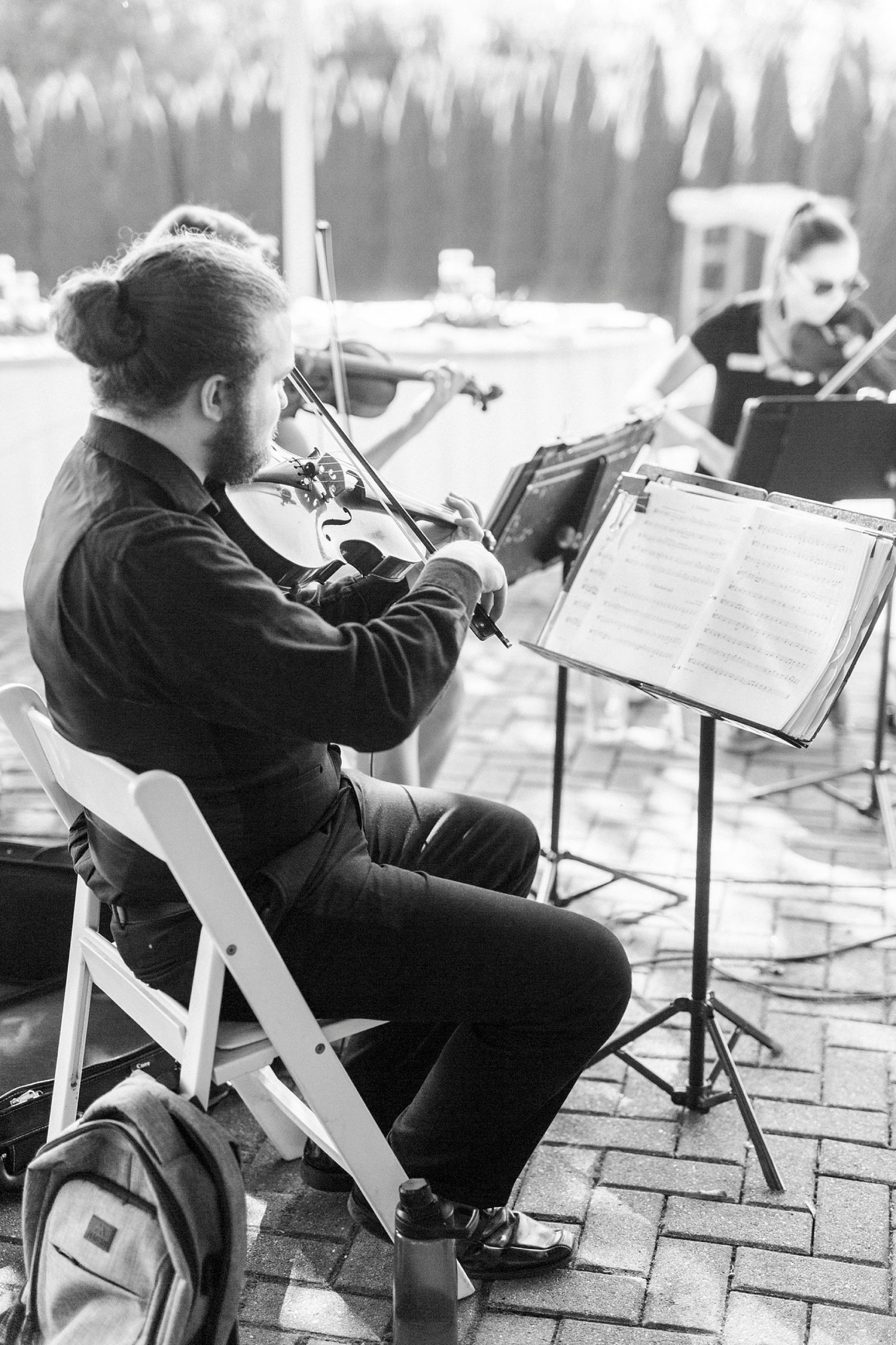 string player performs during The Inn at Crestwood wedding