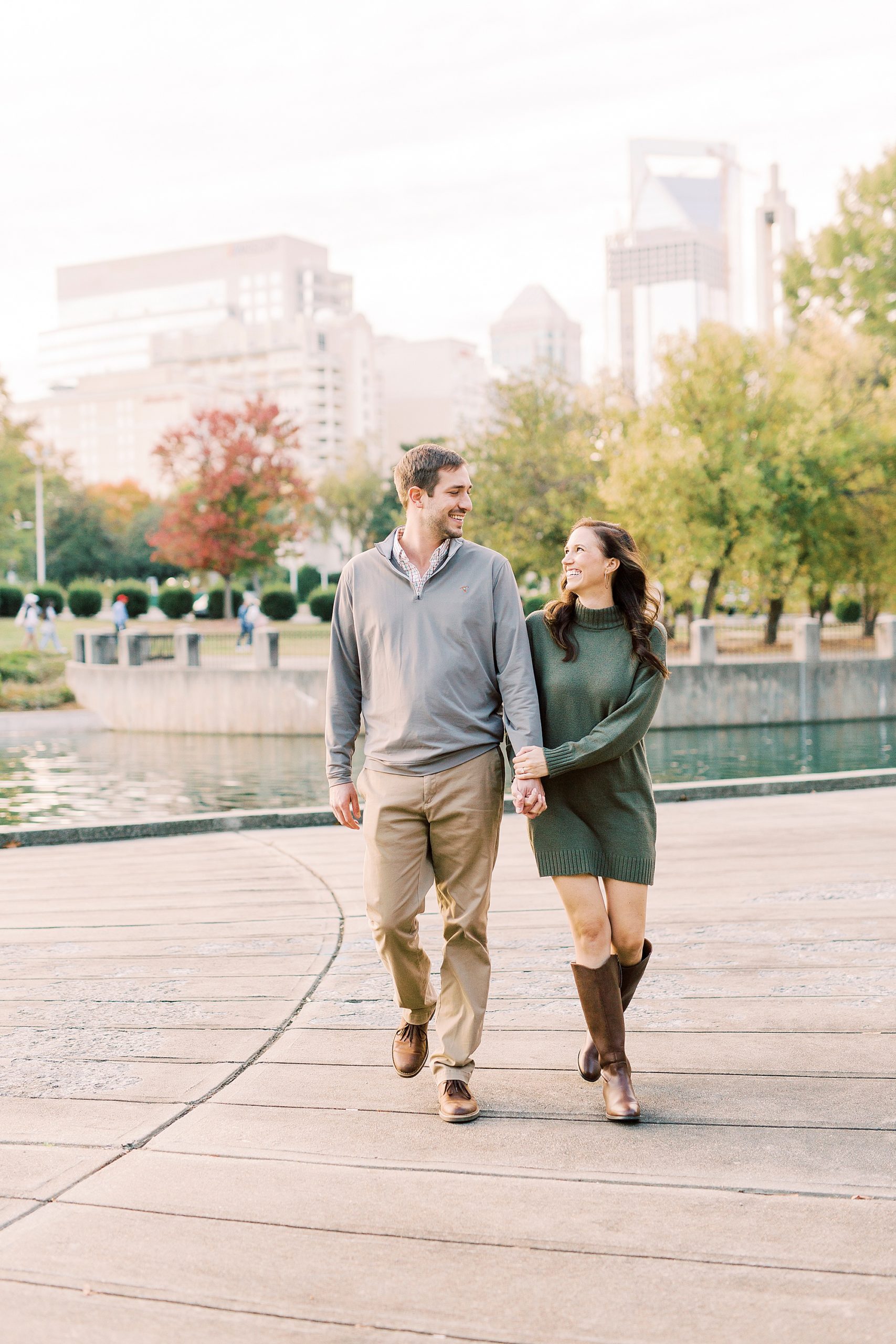 bride and groom walk through Marshall Park during engagement photos