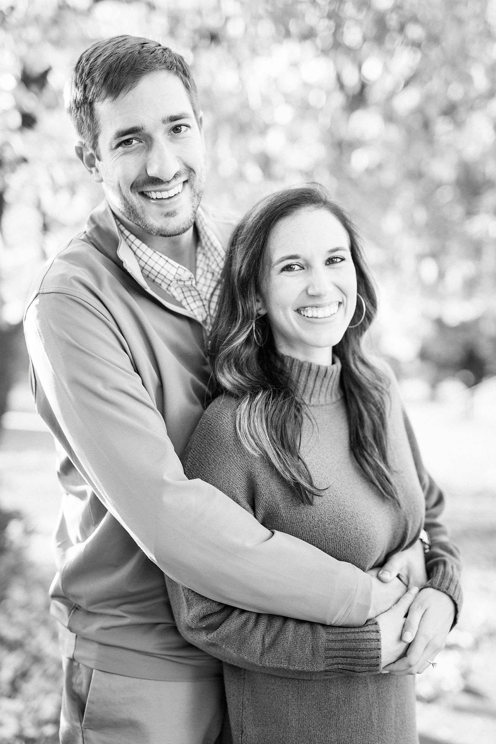 engaged couple hugs during fall session in Charlotte NC