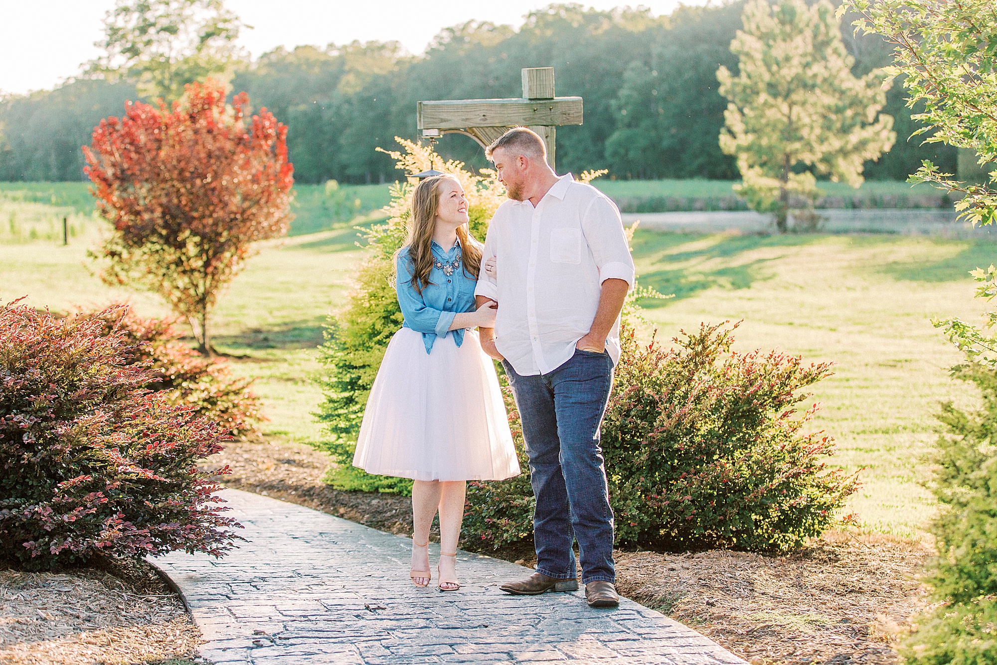 bride and groom look at each other during NC engagement session